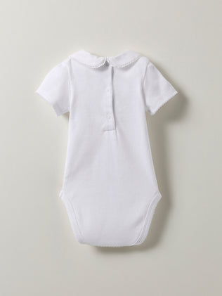 Baby's organic cotton bodysuit with embroidered collar