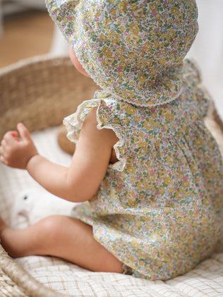 Baby's rompersuit made with Liberty fabric