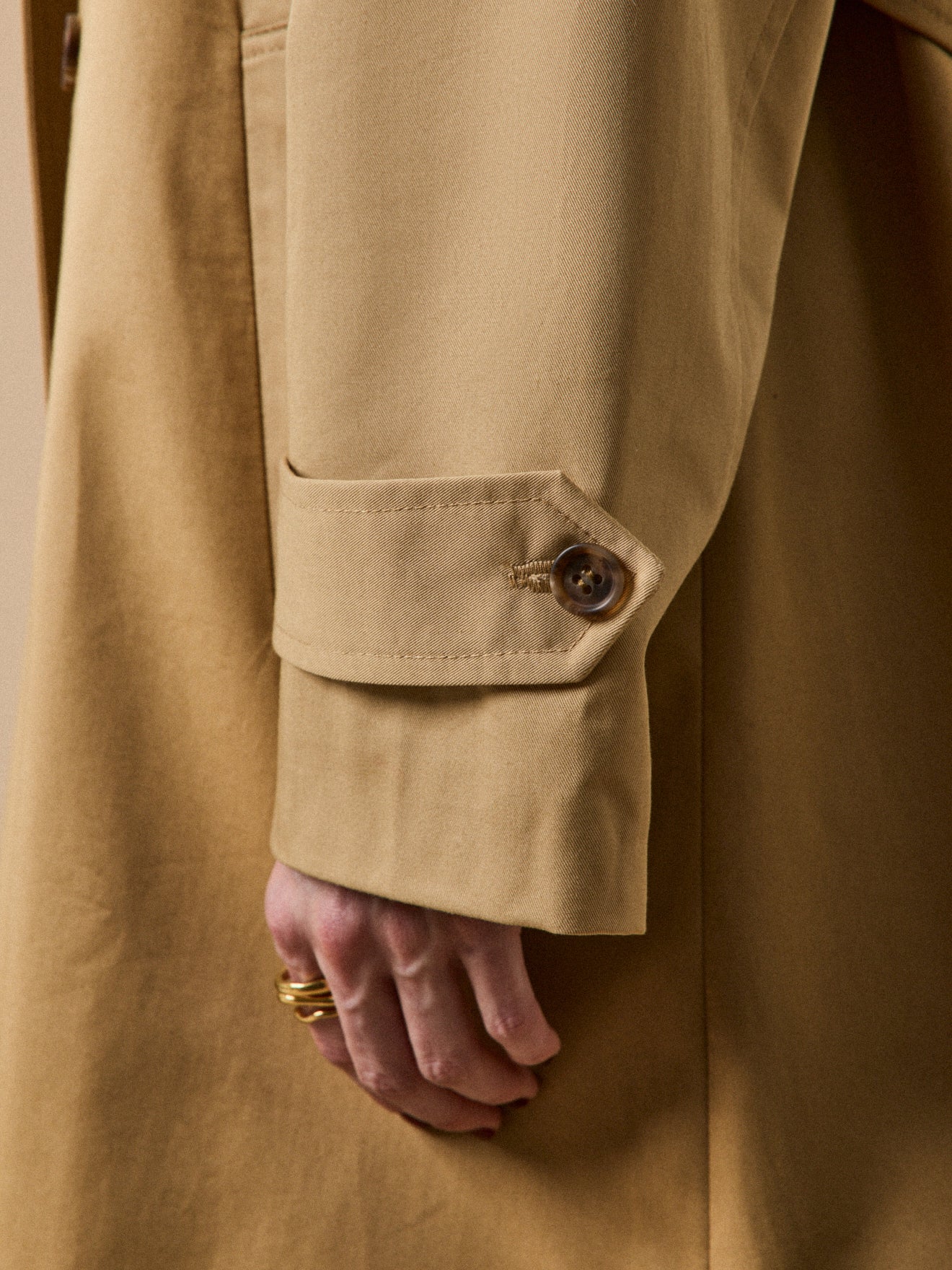 Women's long organic cotton trench coat with notched lapels