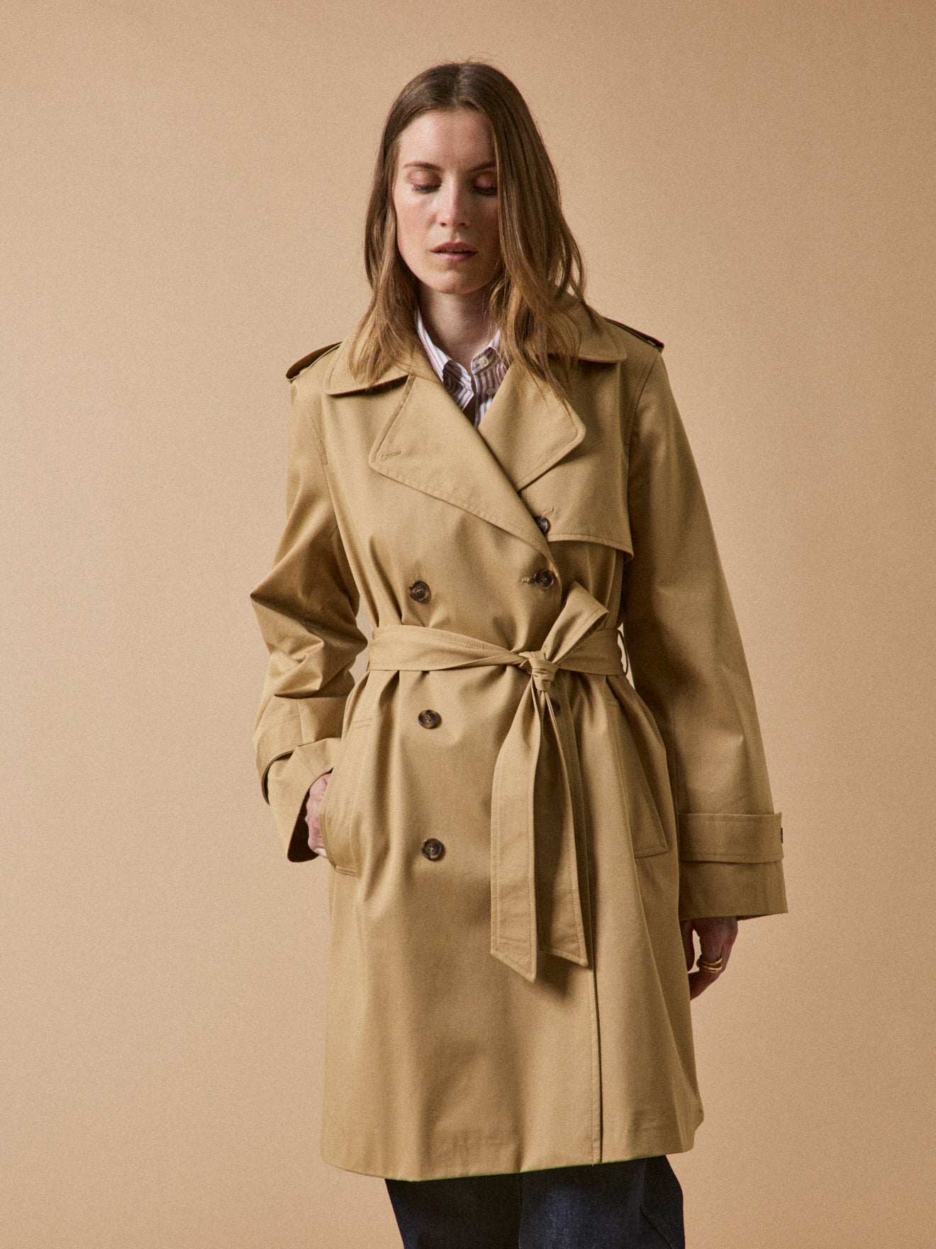 Women's long organic cotton trench coat with notched lapels