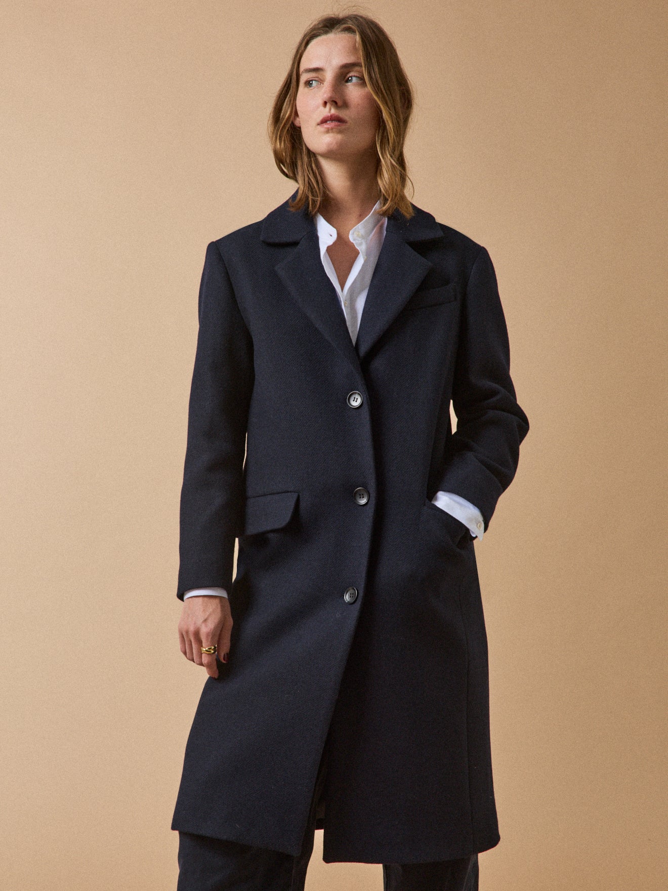 Women's long plain woolen coat with notched lapels