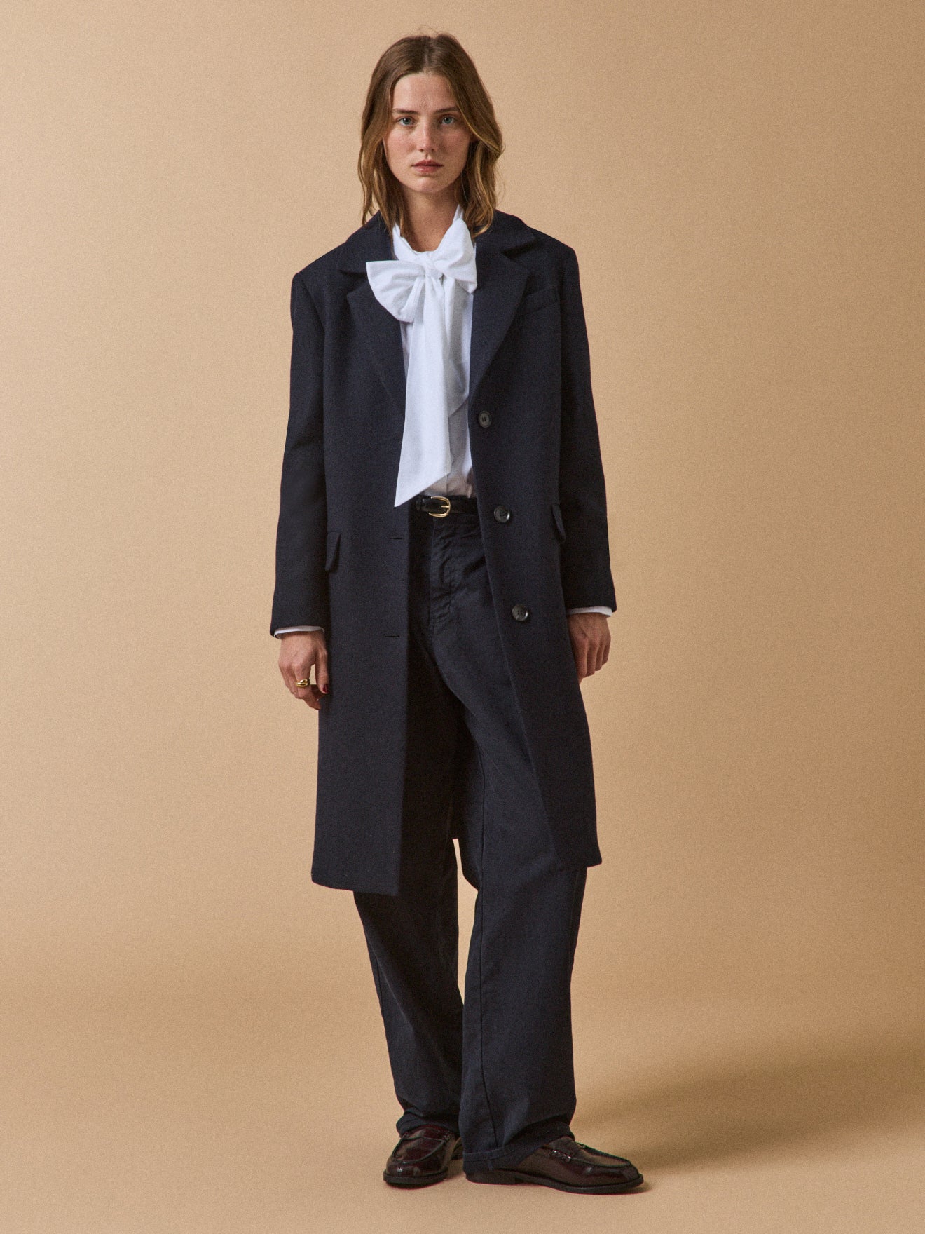 Women's long plain woolen coat with notched lapels