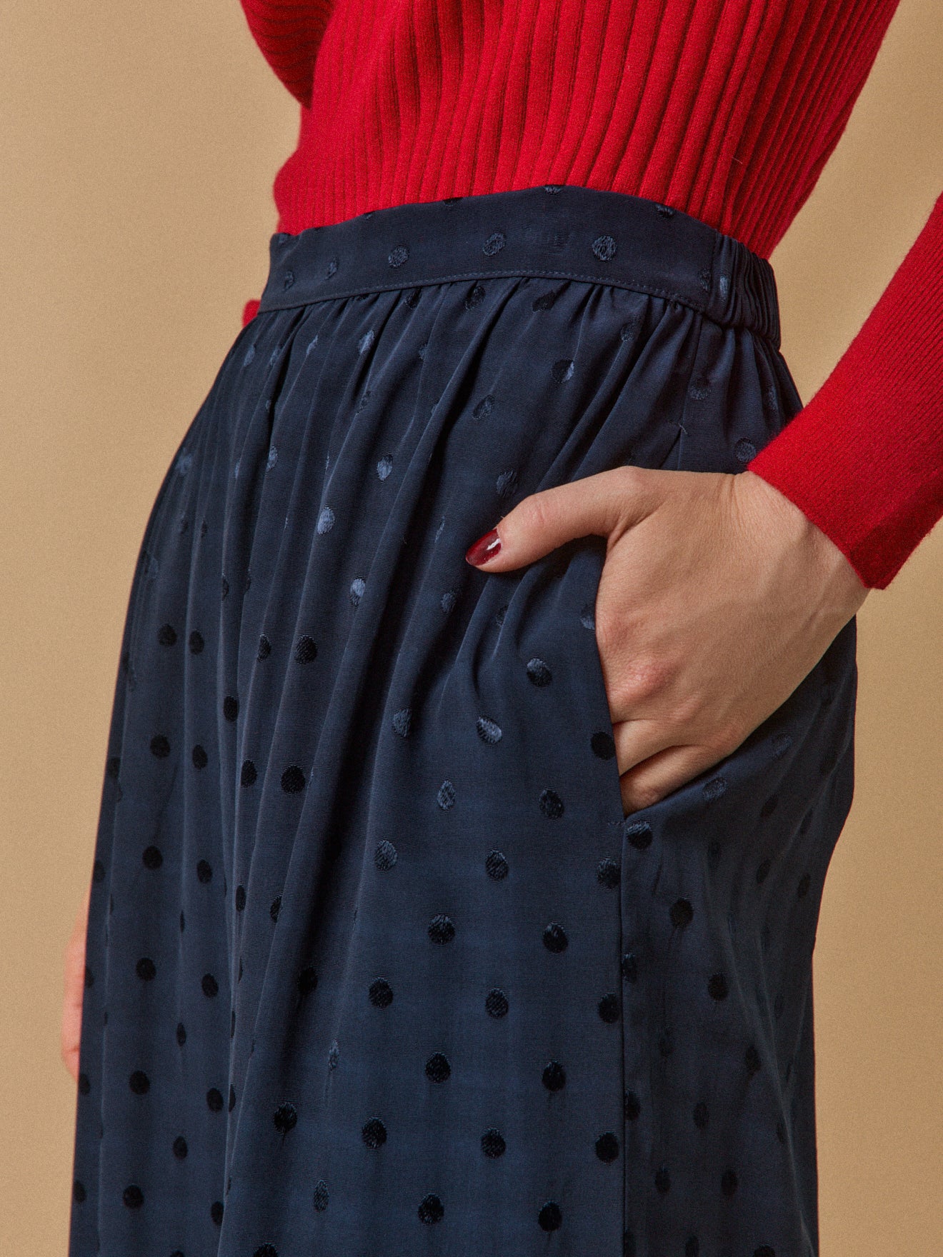 Jupe mi-longue jacquard pois femme