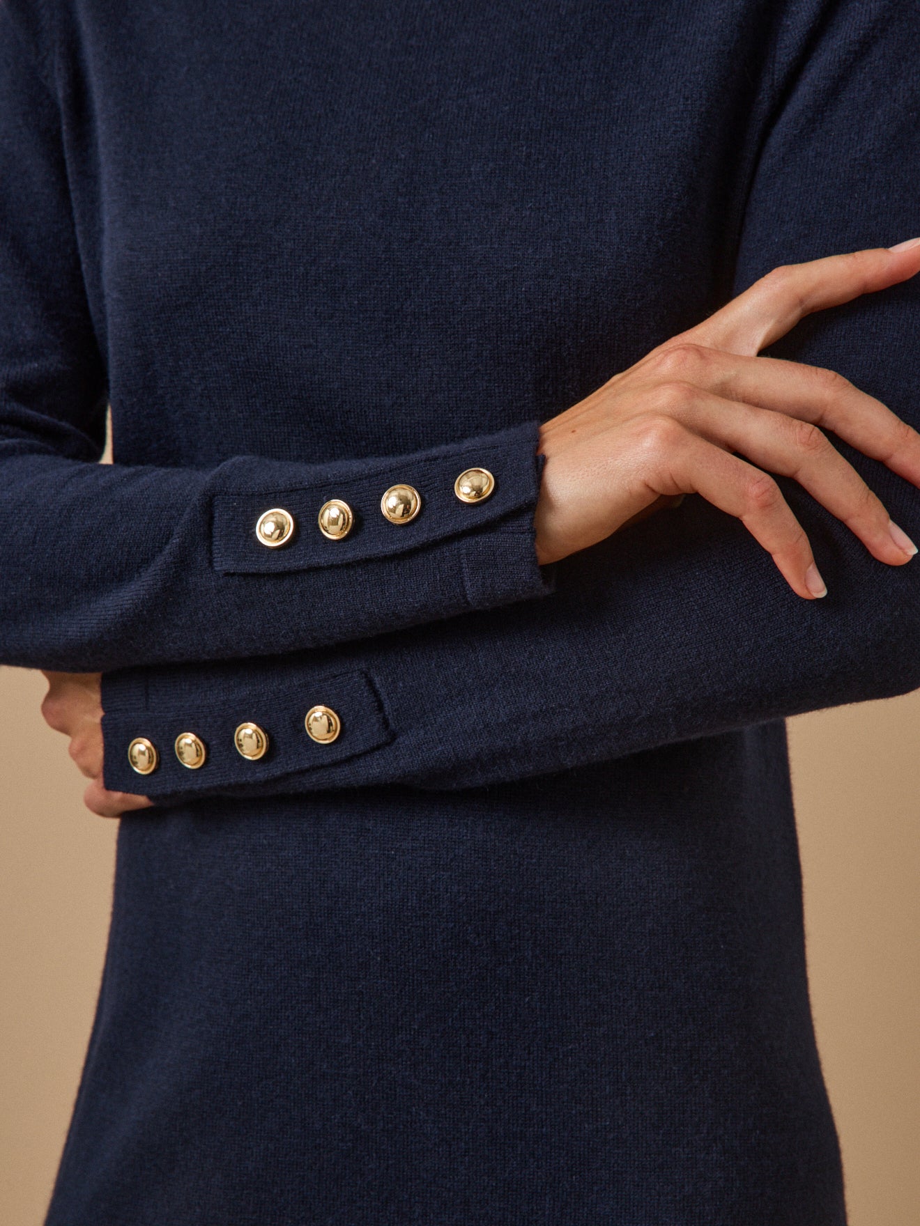 Women's sweater-dress with high neckline and golden buttons