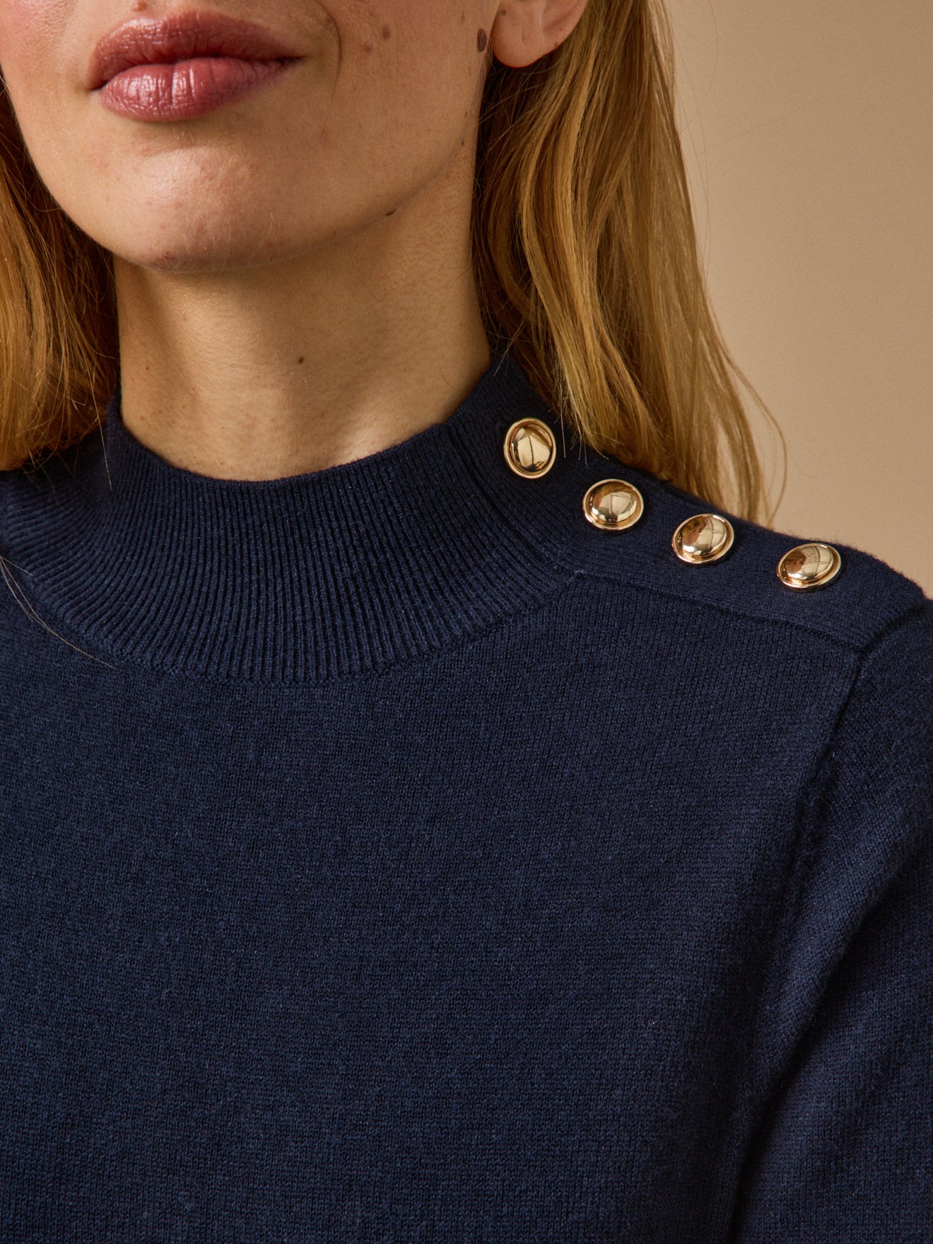 Women's sweater-dress with high neckline and golden buttons