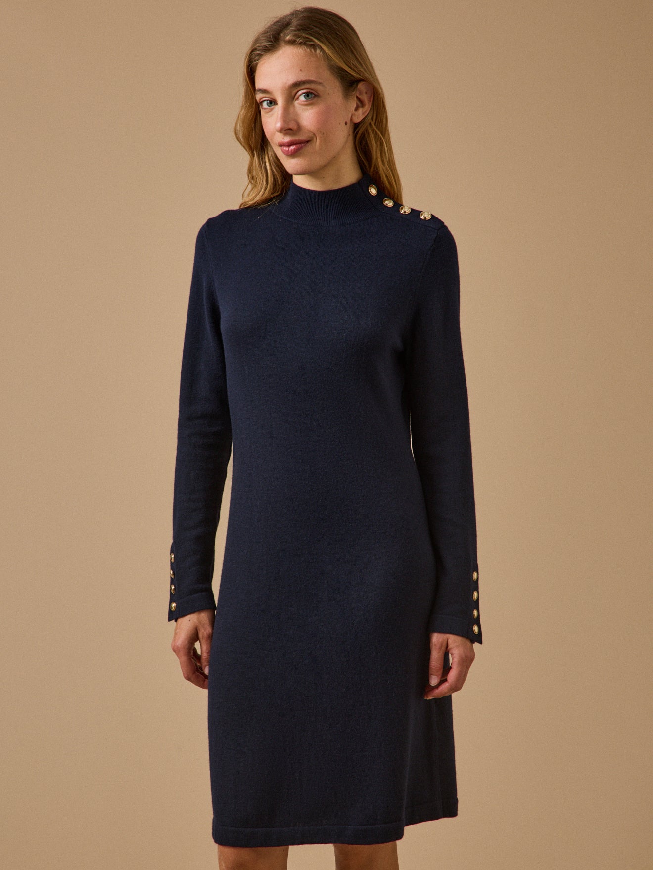 Women's sweater-dress with high neckline and golden buttons