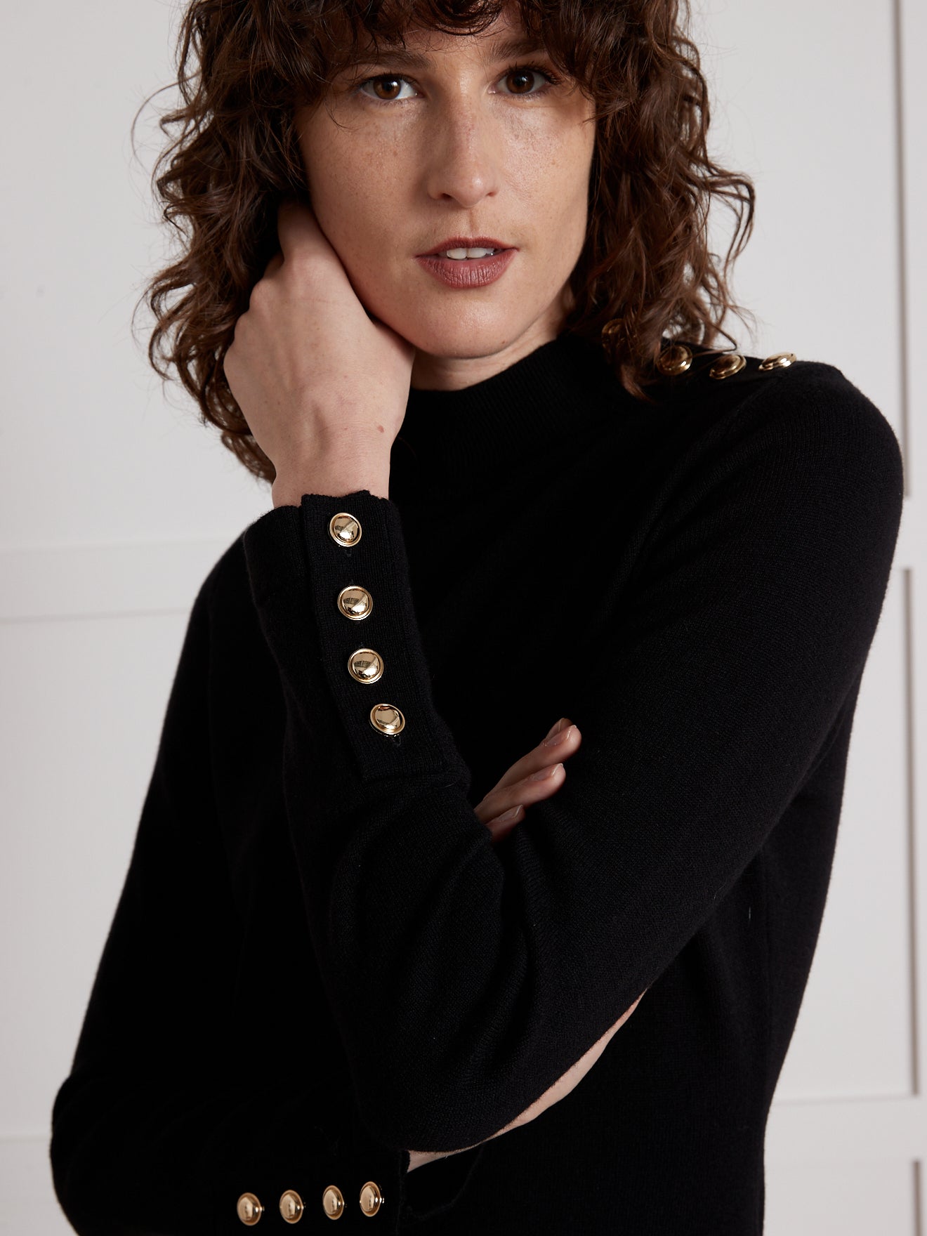 Women's sweater-dress with high neckline and golden buttons