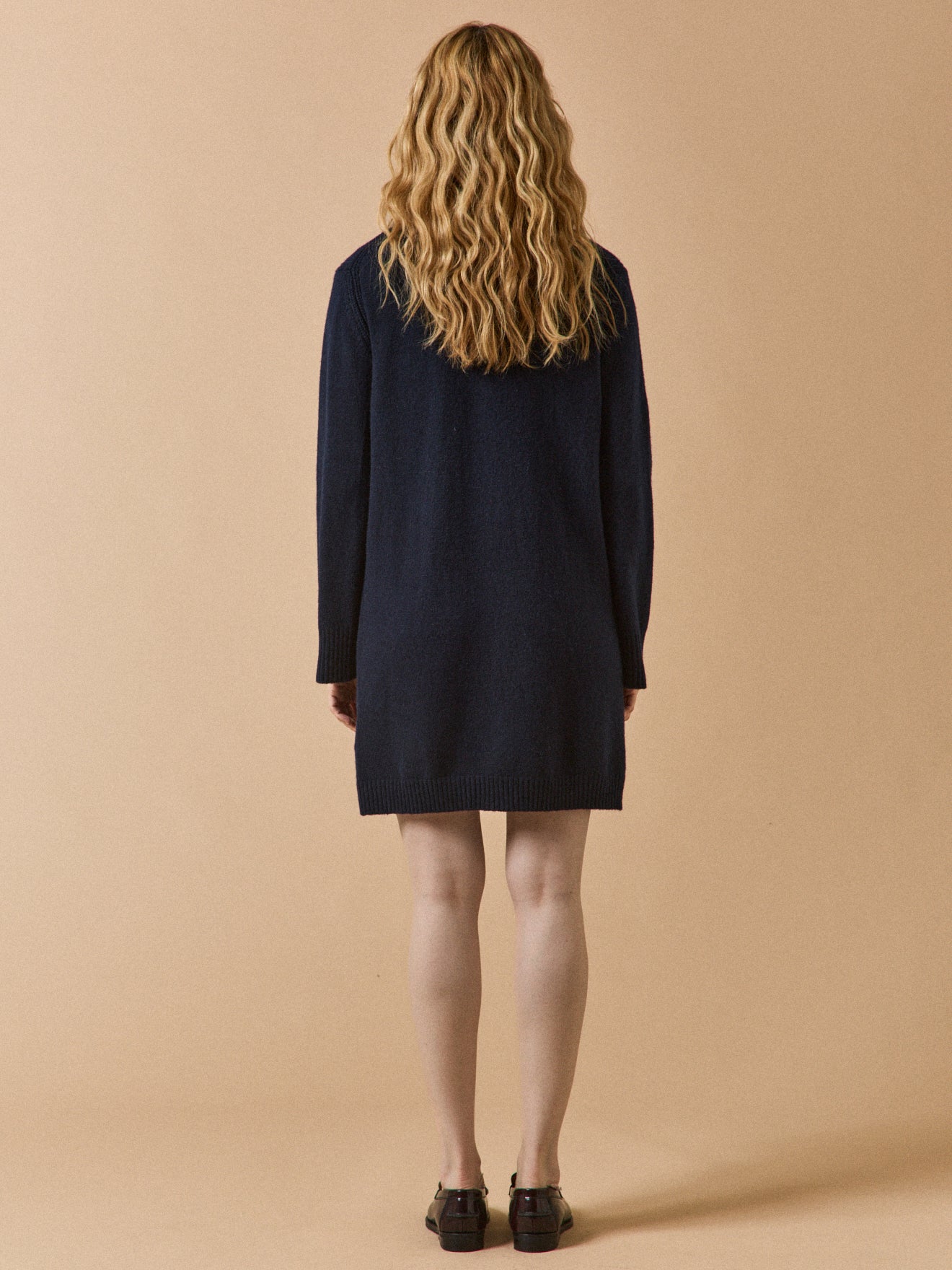 Women's sweater-dress with polo shirt collar and golden buttons