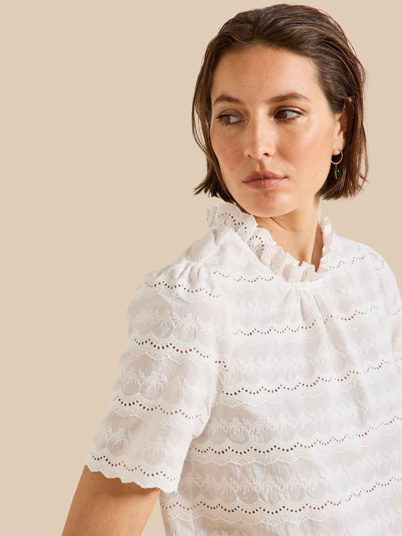 Women's broderie anglaise top with ruffled neckline