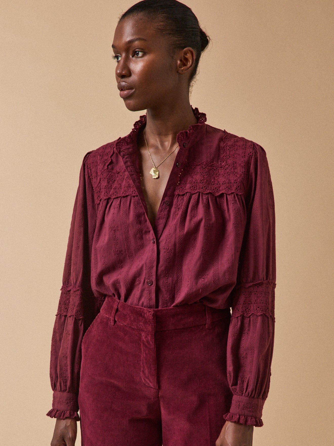 Women's embroidered heirloom blouse with ruffled neckline