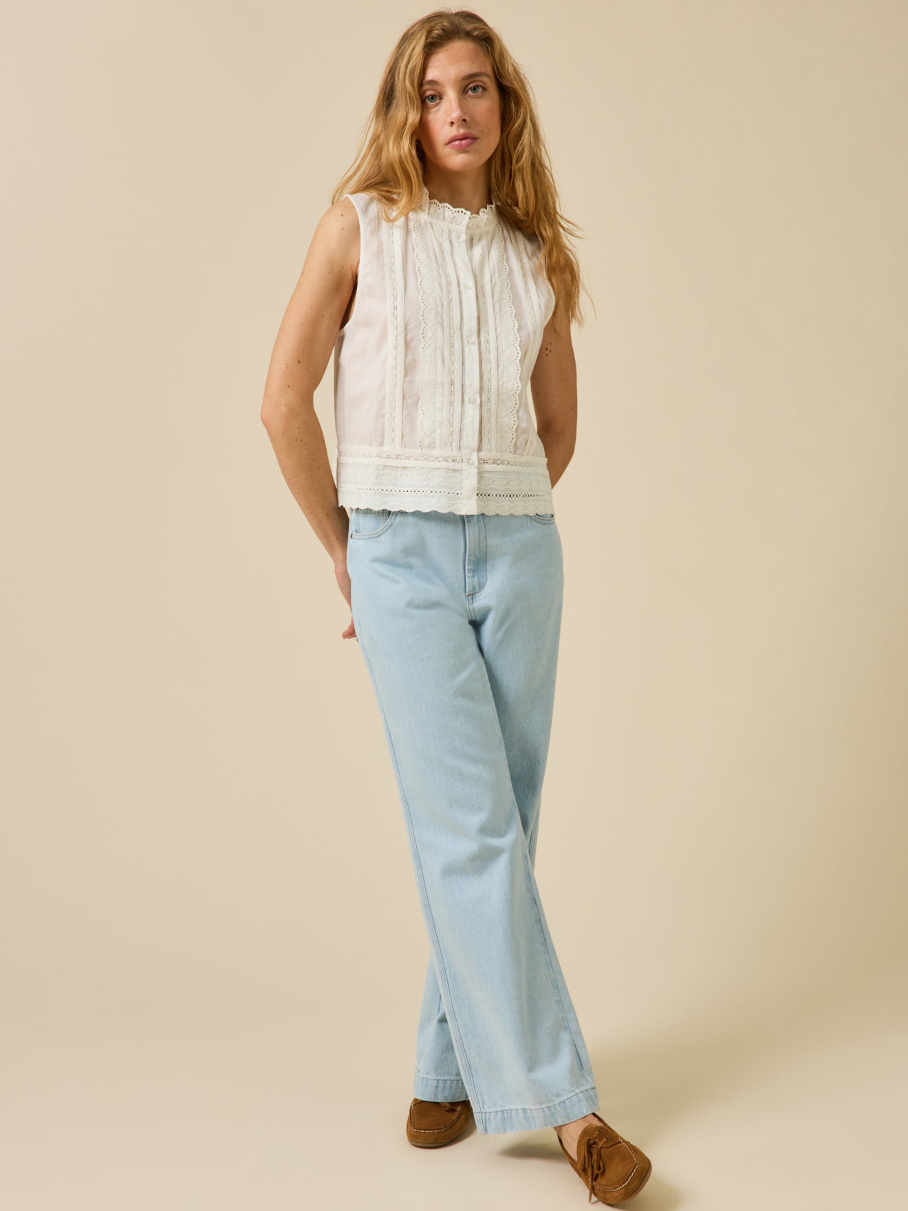 Women's button-up sleeveless embroidered top