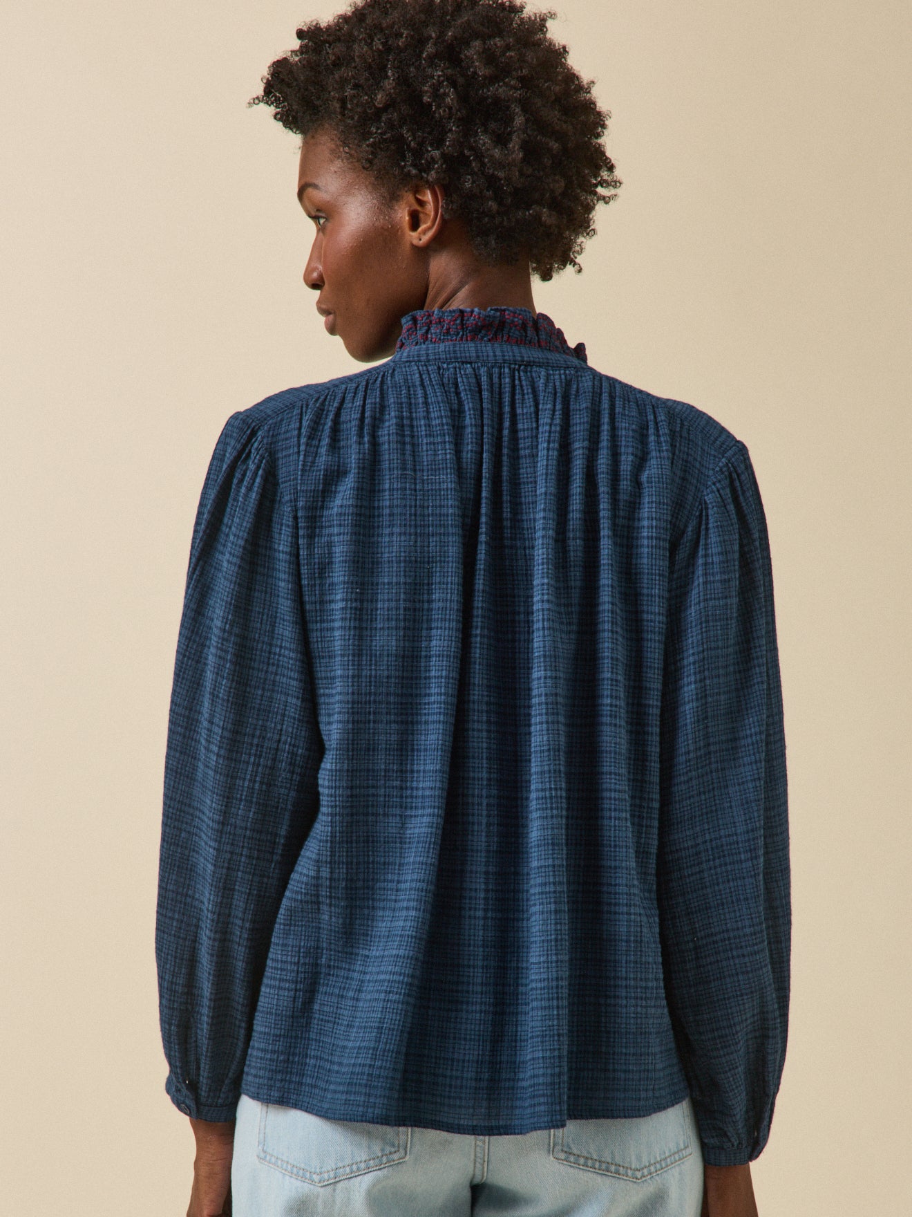 Women's crepon blouse with embroidered ruffle