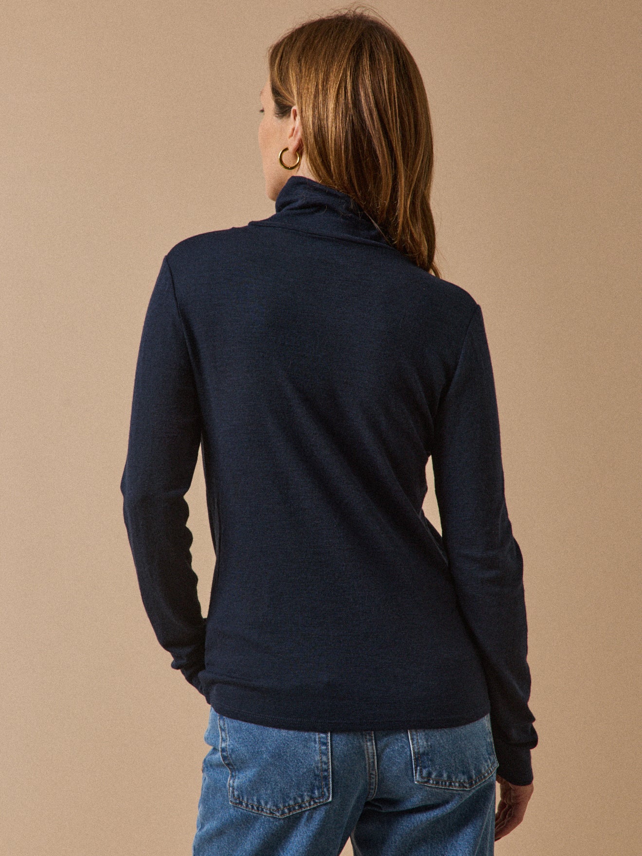 Women's wool jersey top with rollneck