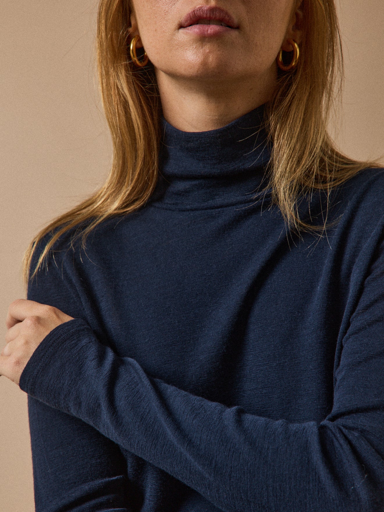 Women's wool jersey top with rollneck