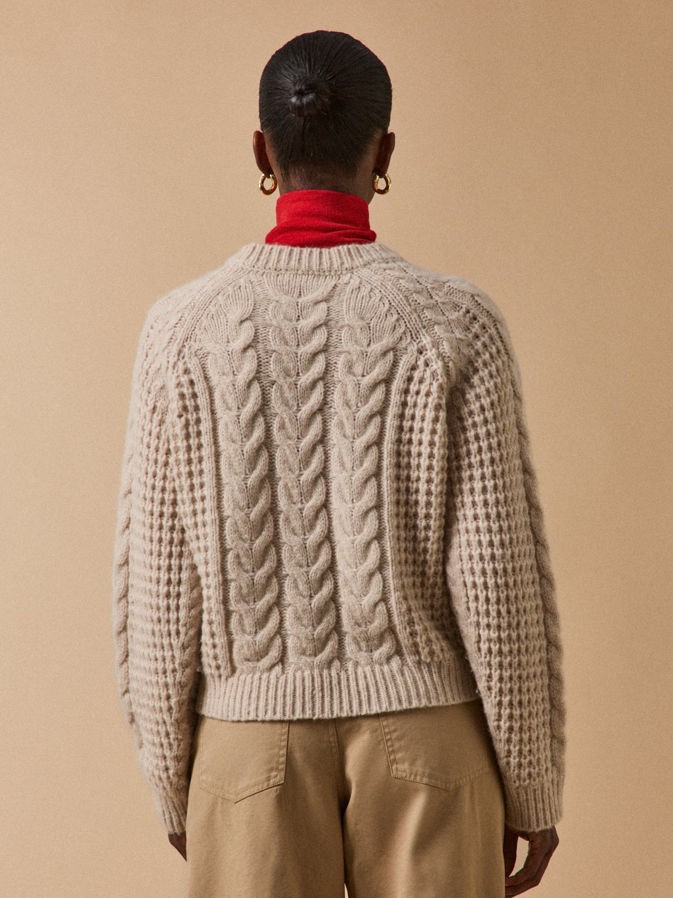 Women's merino wool blend cable-knit sweater