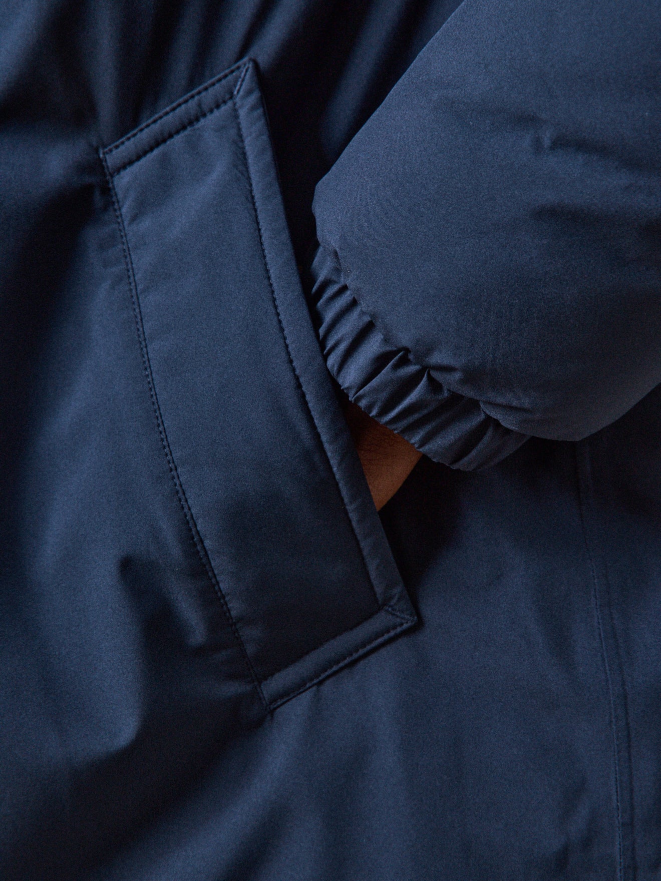 Man's long waterproof parka