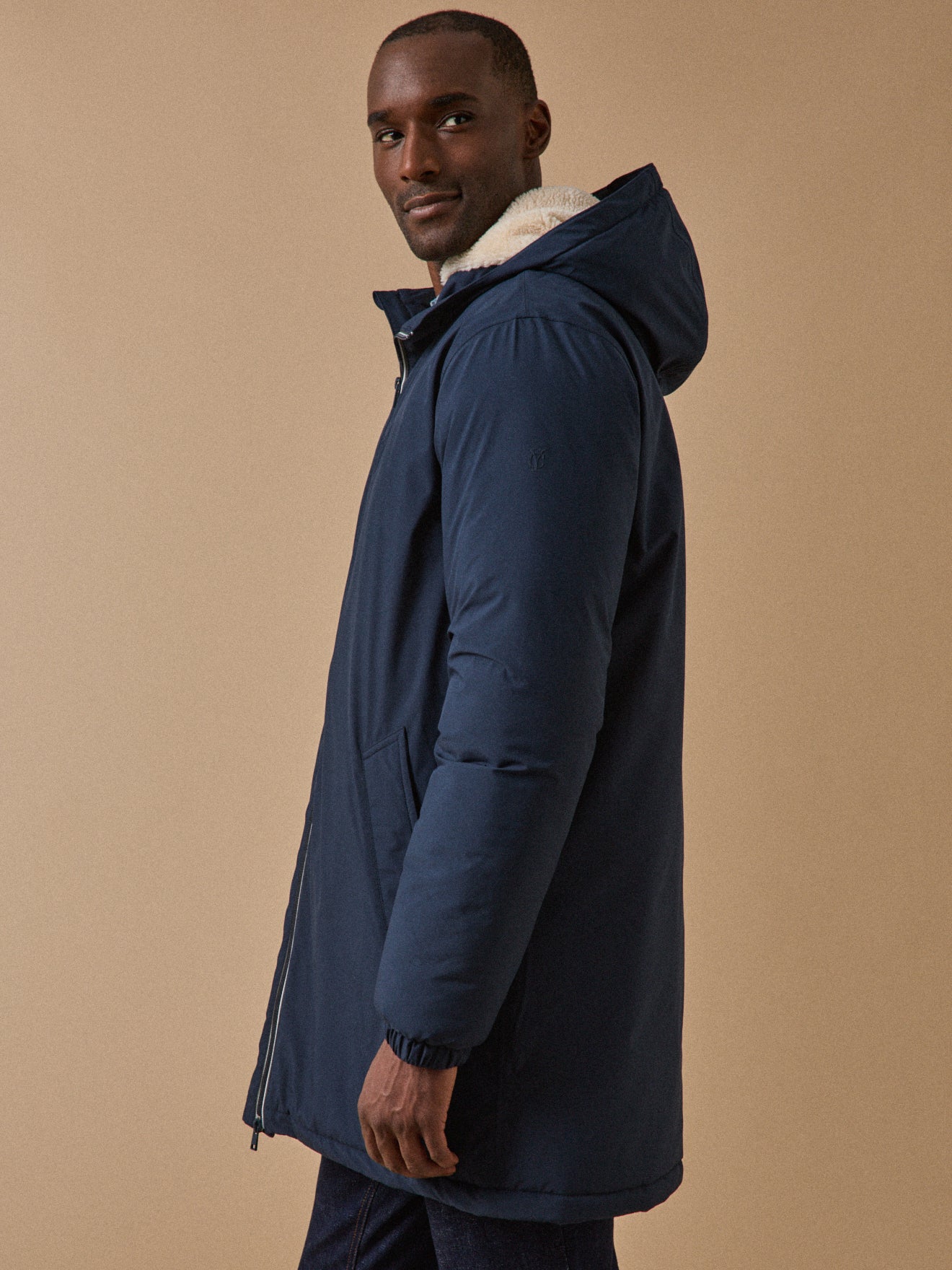 Man's long waterproof parka