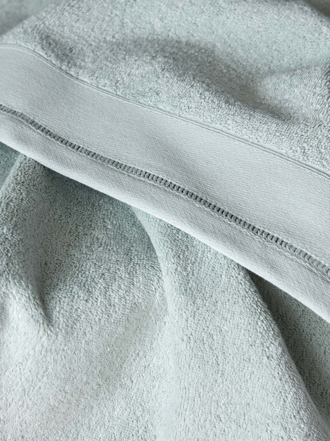 Terry cloth towel with ladderline stitching