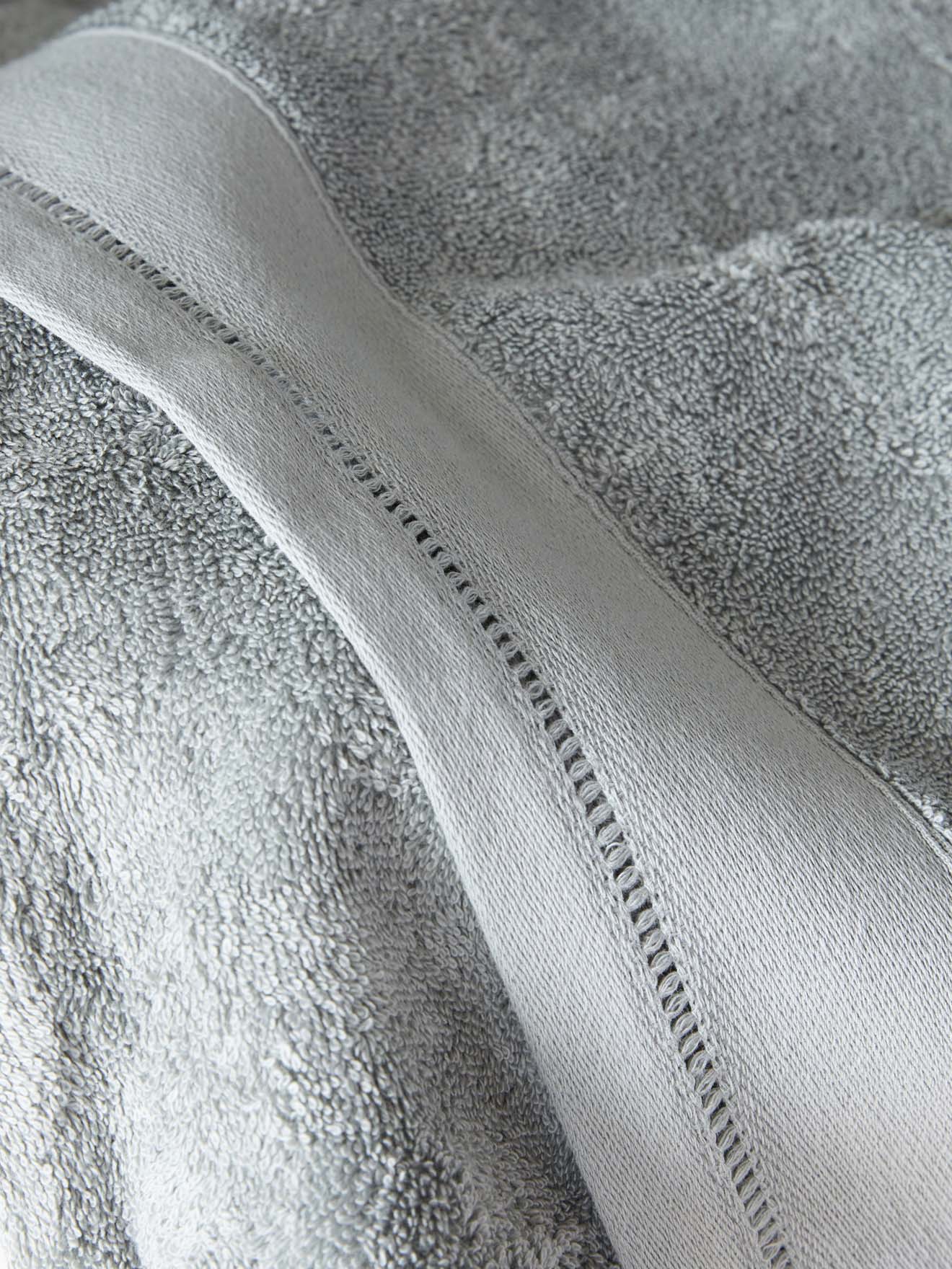 Terry cloth towel with ladderline stitching