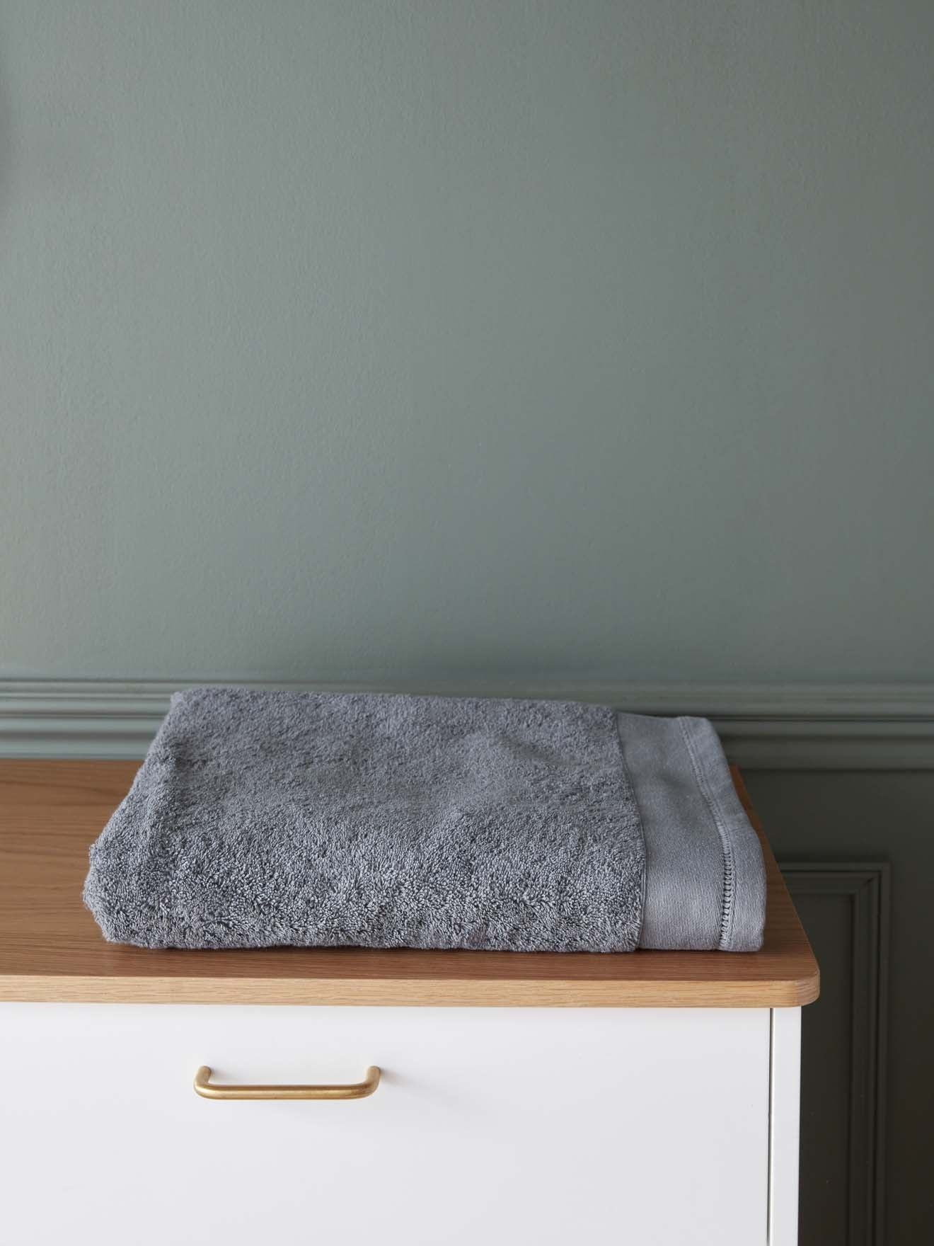 Terry cloth towel with ladderline stitching