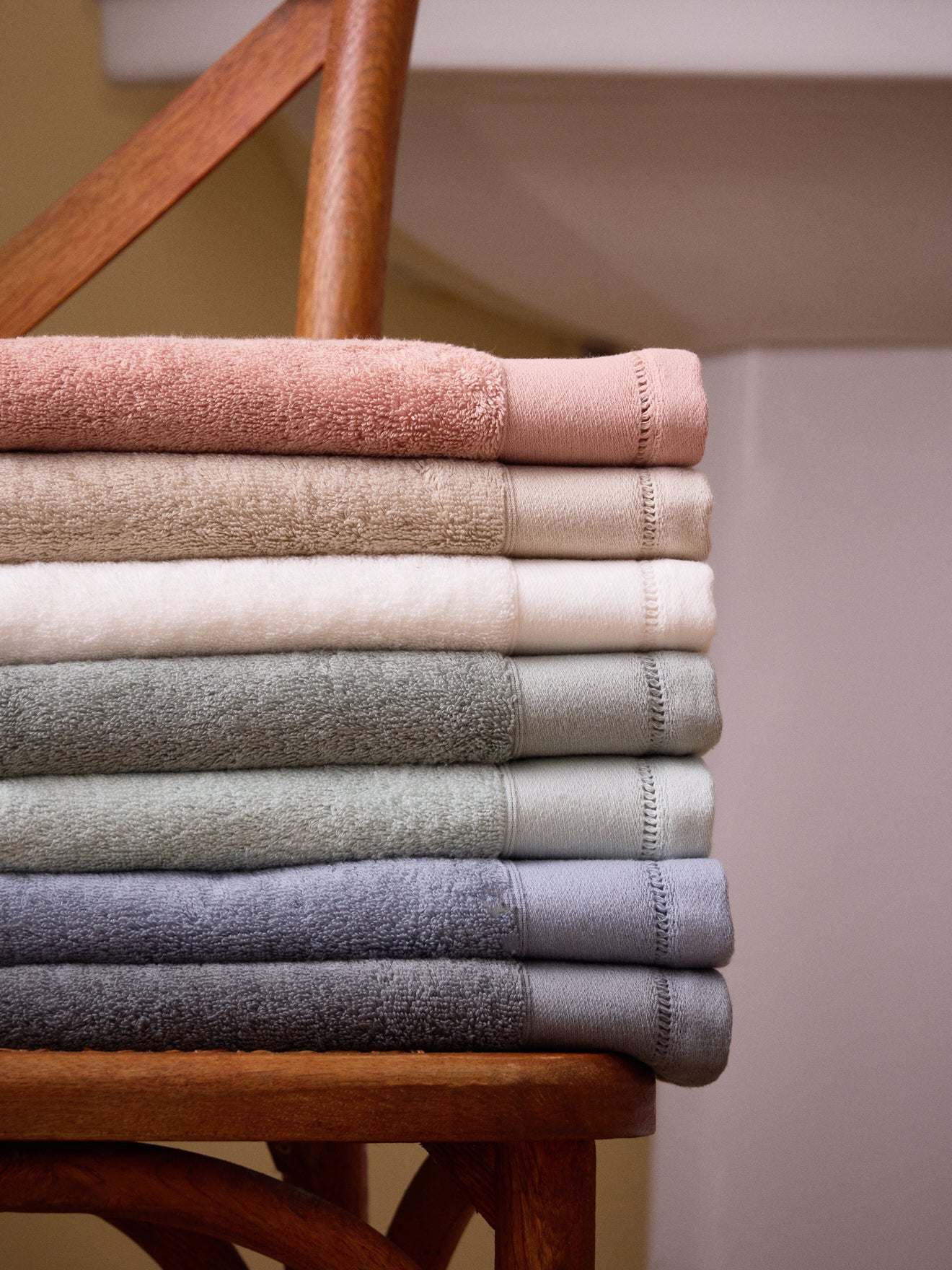 Terry cloth towel with ladderline stitching