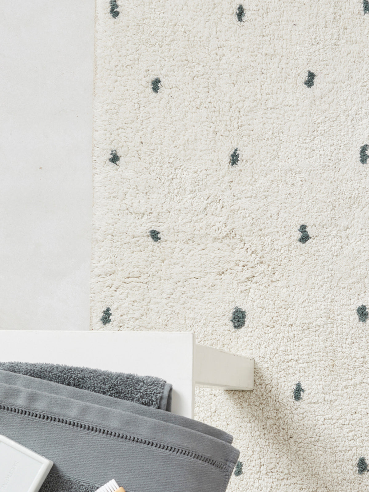 Tapis de bain à pois