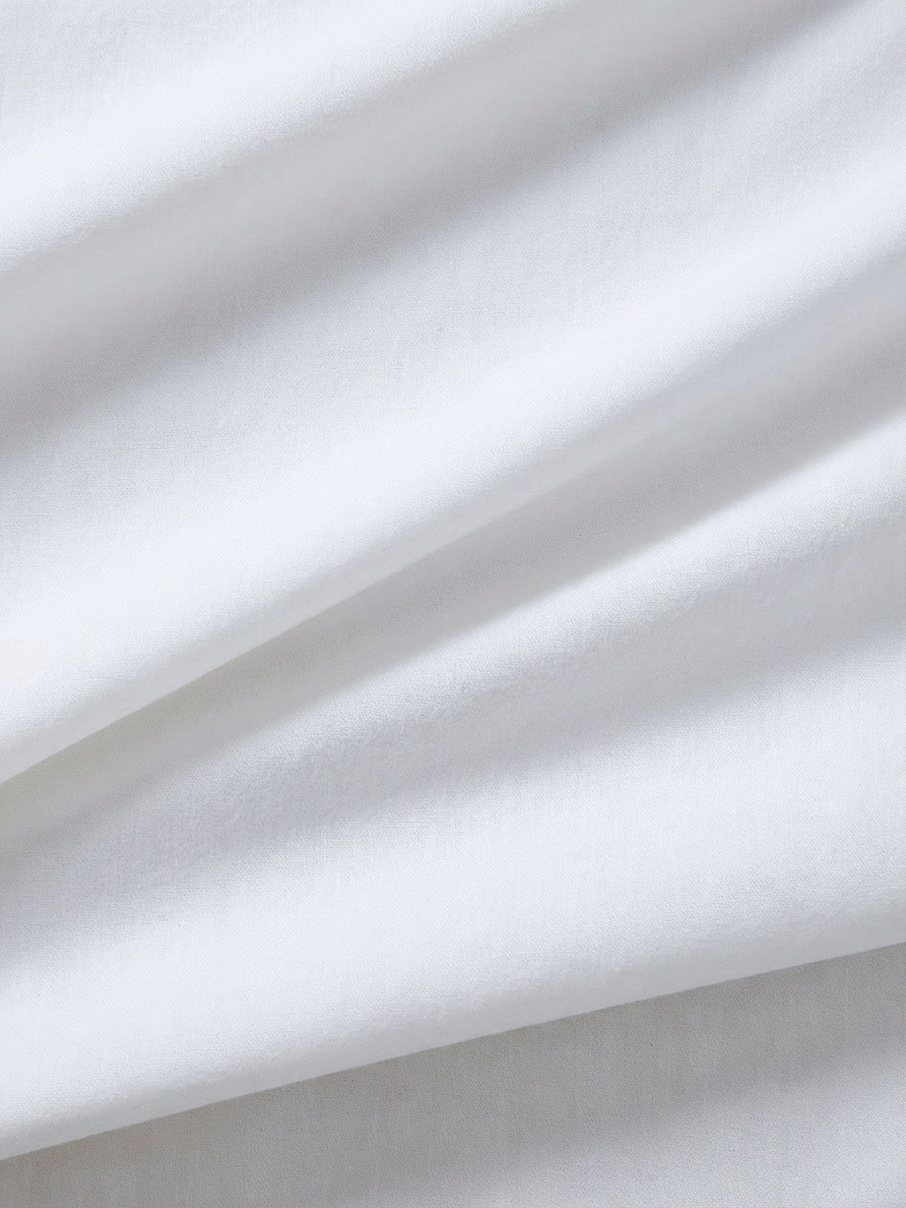 ‟Cocoonˮ solid-color fitted sheet in pre-washed linen