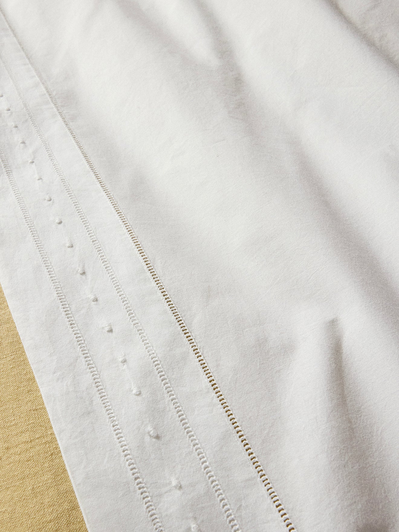 Aglaé embroidered cotton percale flat sheet.