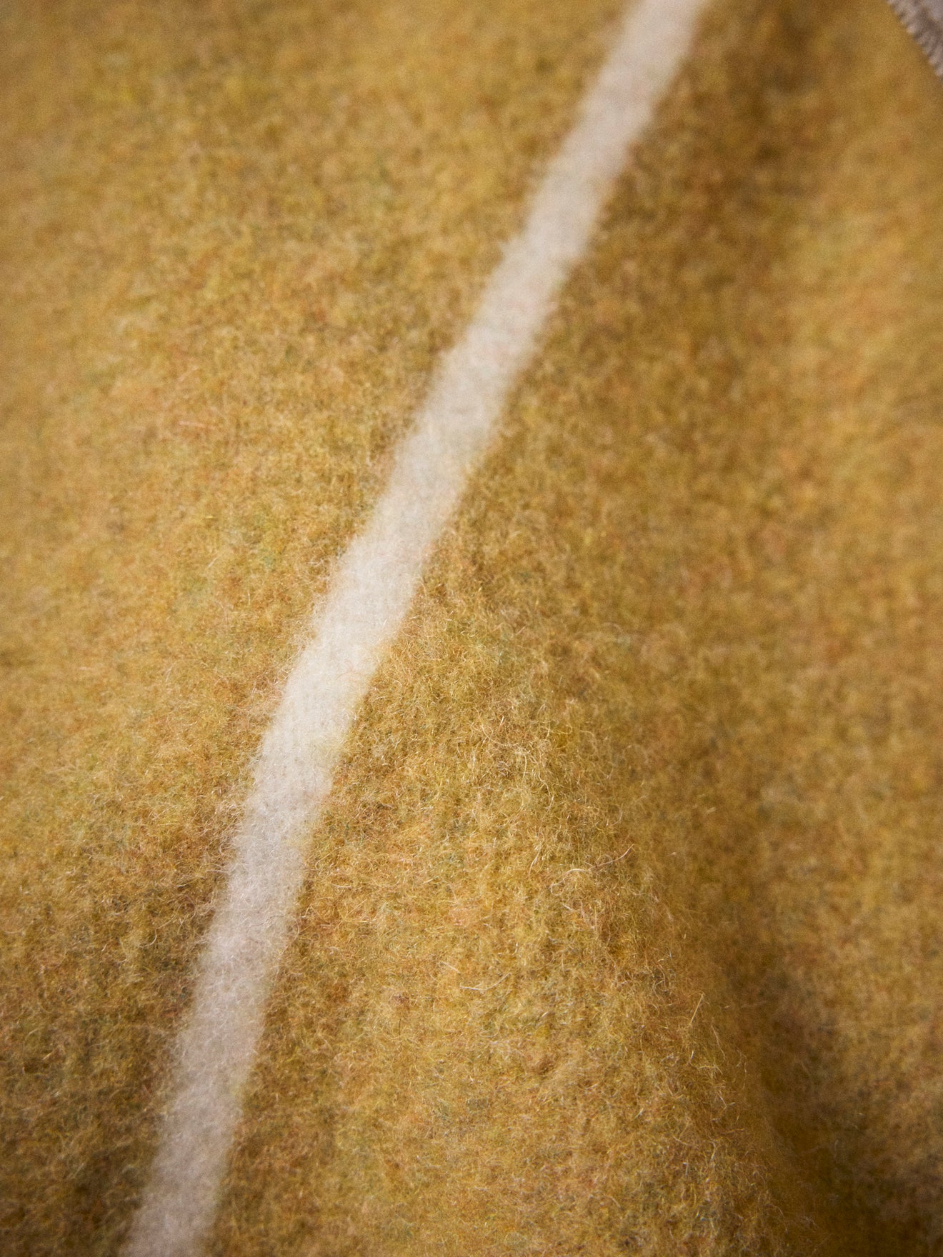 Wool-rich striped throw