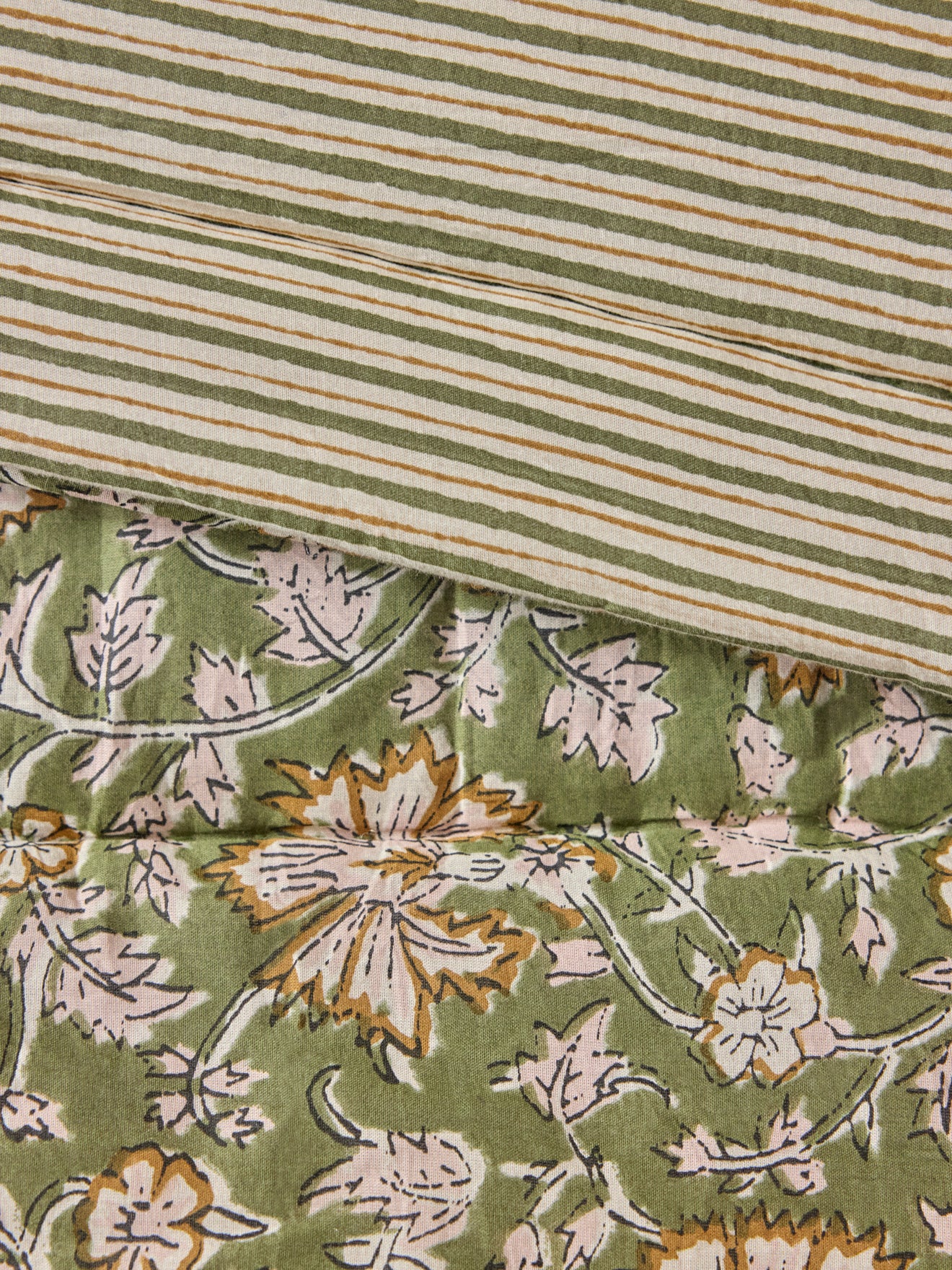 Reversible comforter made with Indian fabric and stripes