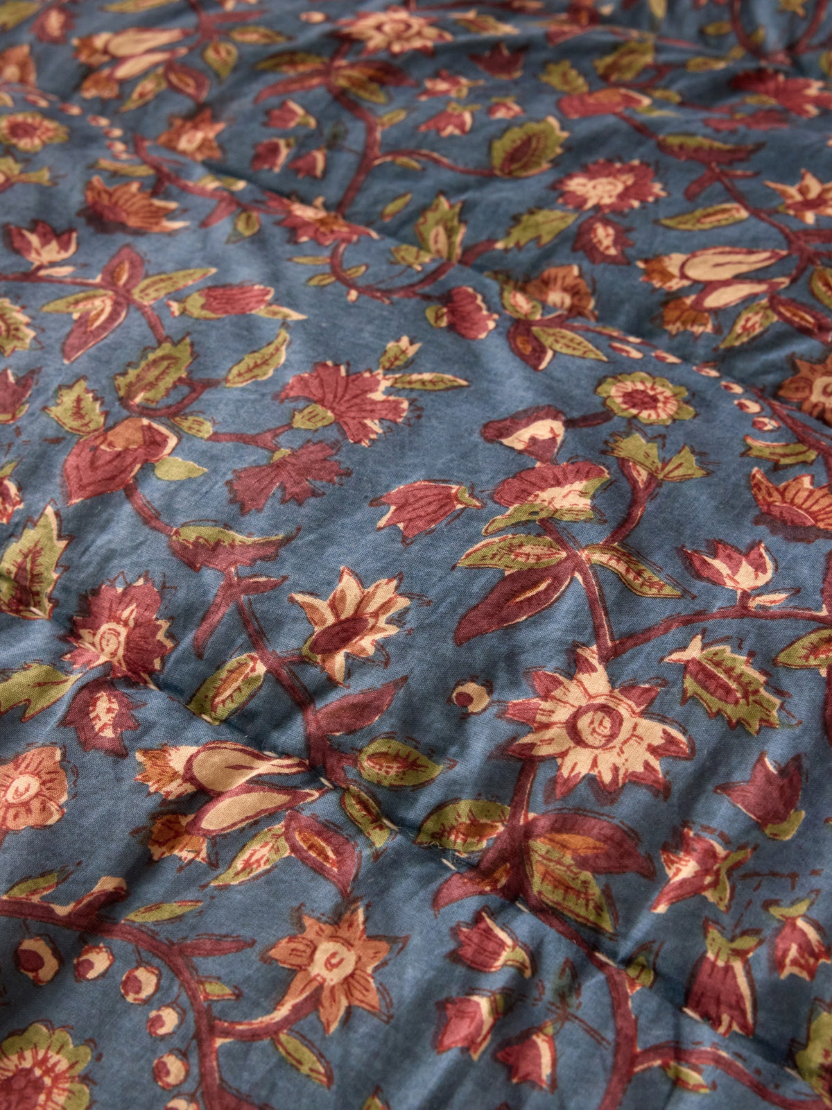 Reversible striped and Indian fabric quilted boutis