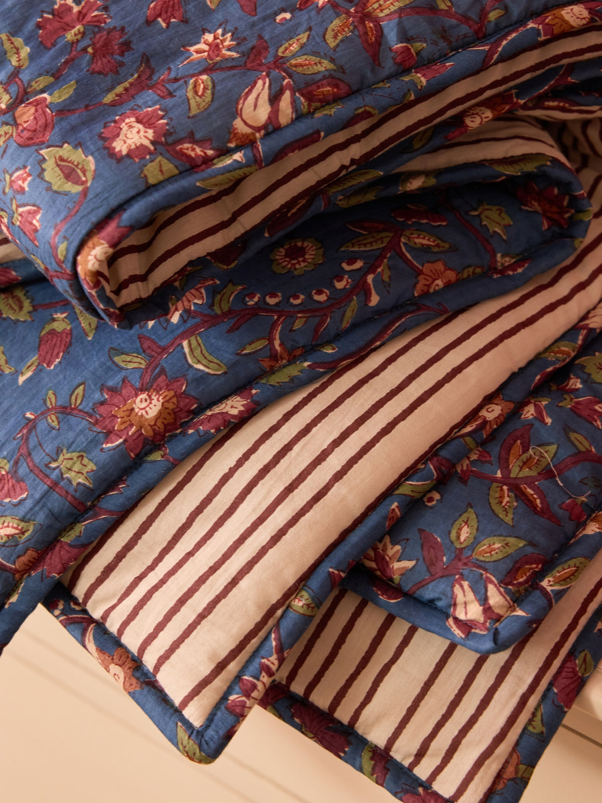 Reversible striped and Indian fabric quilted boutis