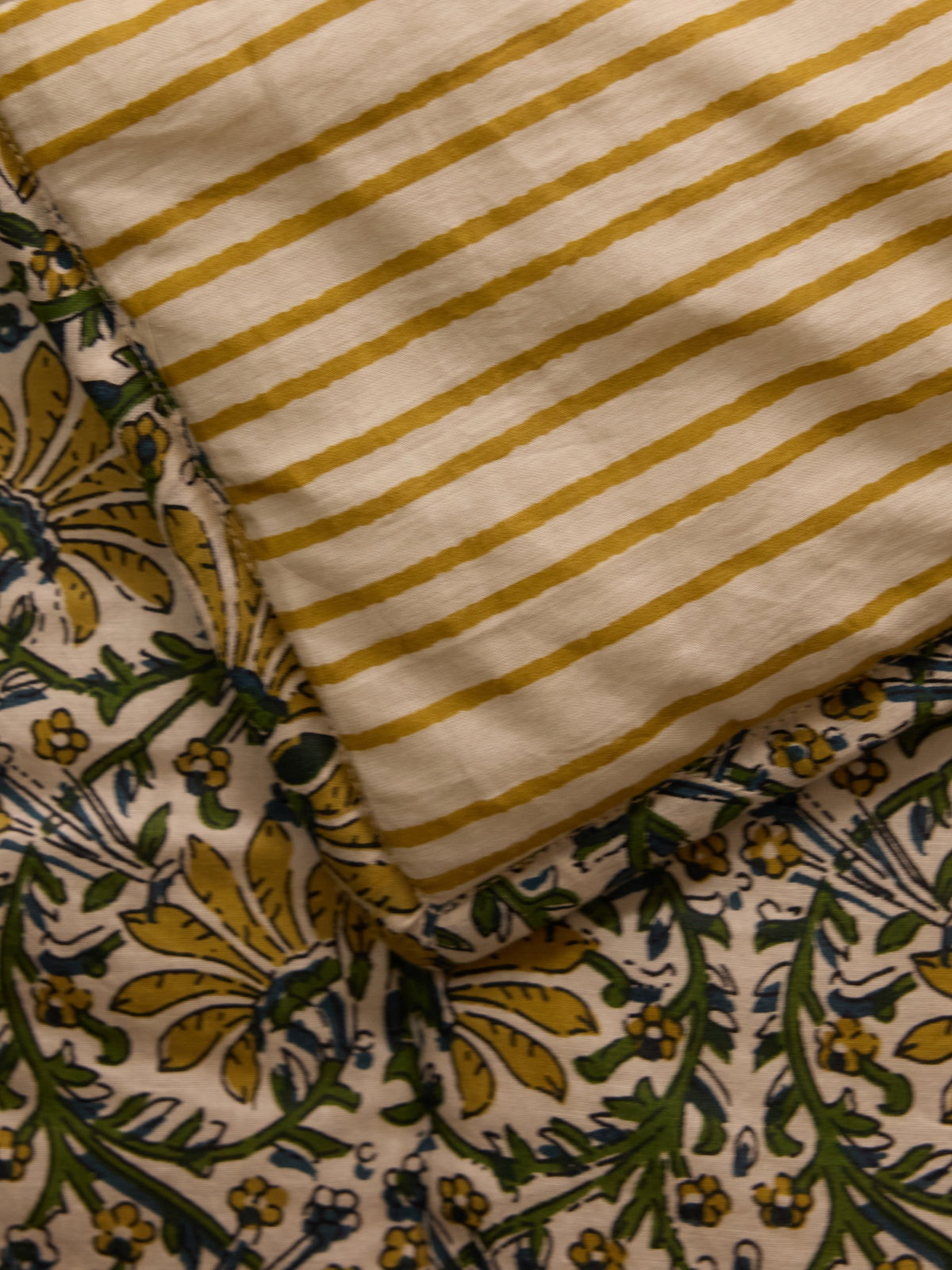 Reversible striped and Indian fabric quilted boutis