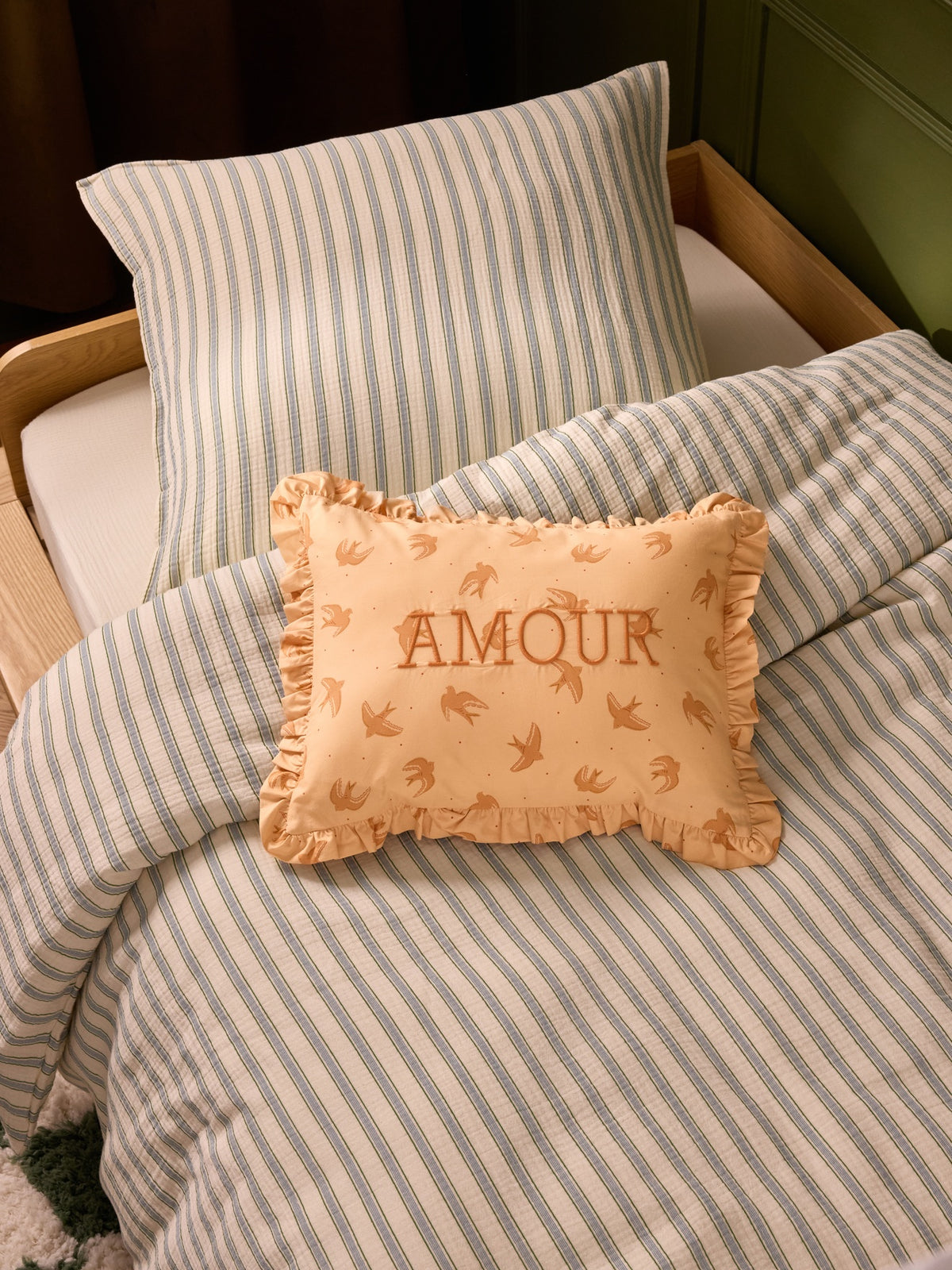 Cushion with Amour embroidery