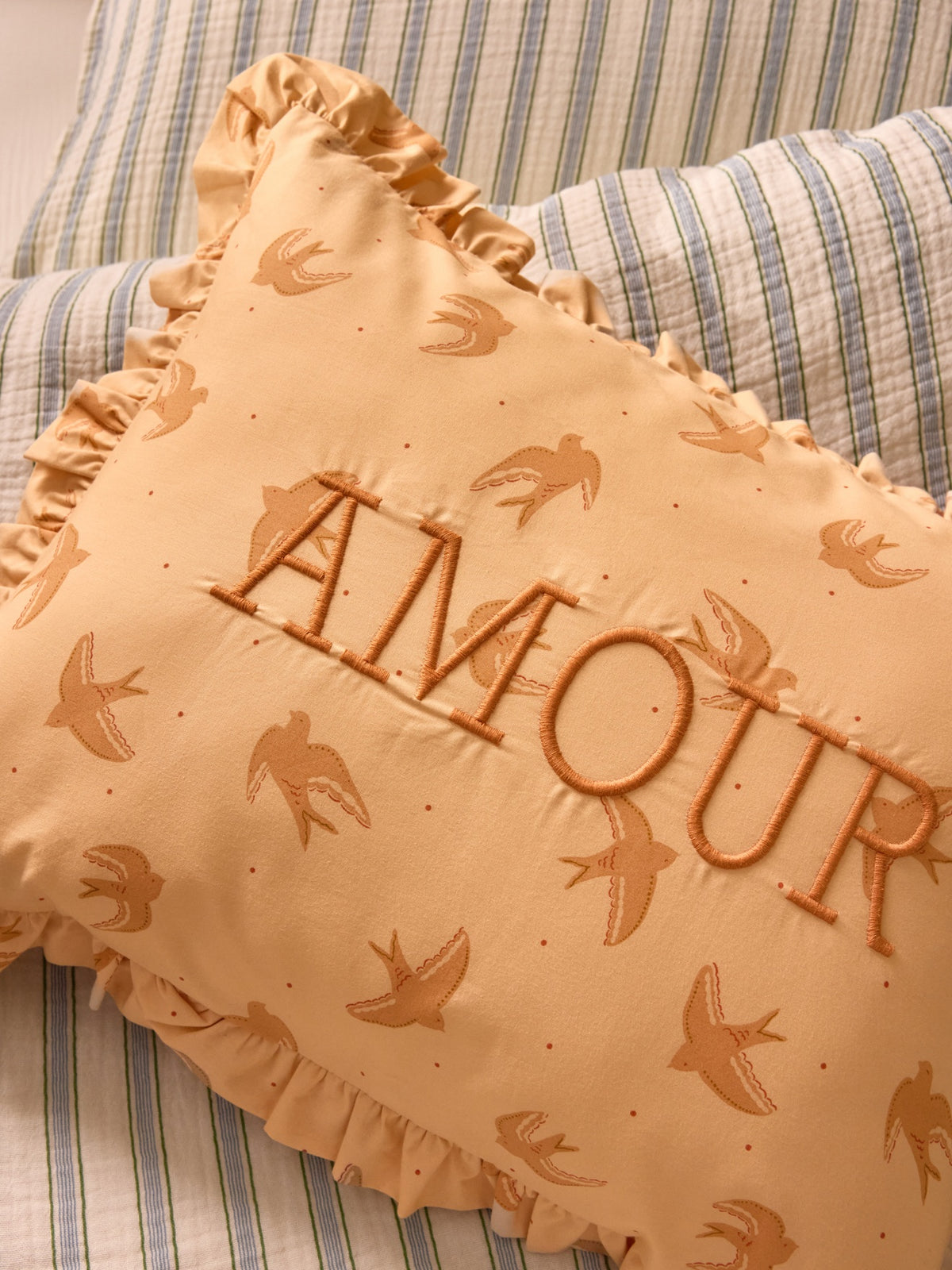 Cushion with Amour embroidery