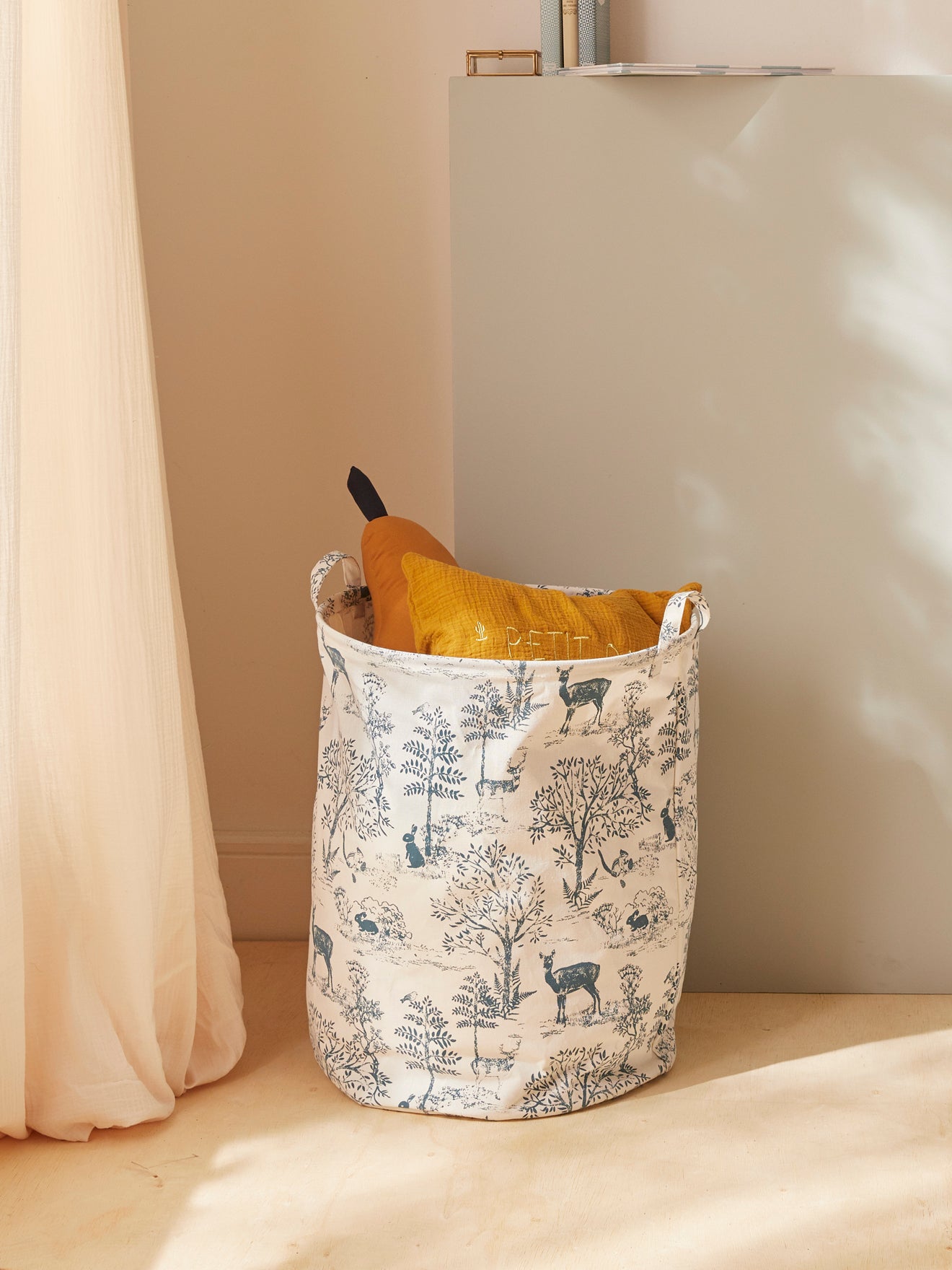 Round Toile de Jouy inspired storage basket