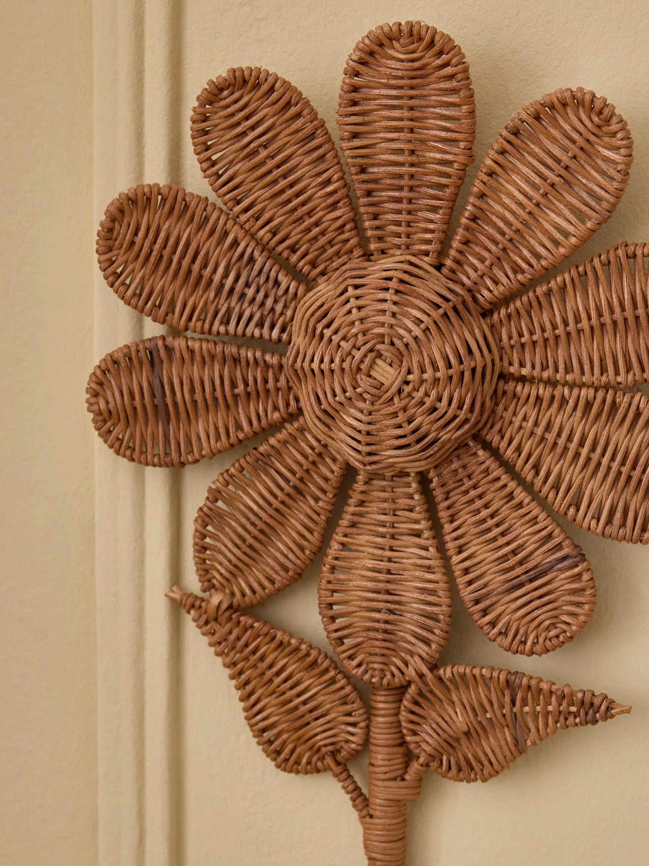 Woven wicker wall flower