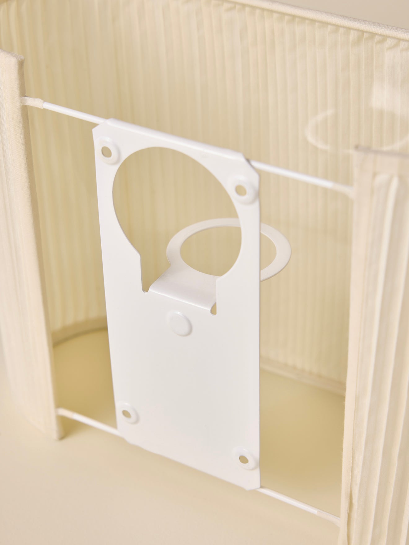 Oval pleated wall lamp