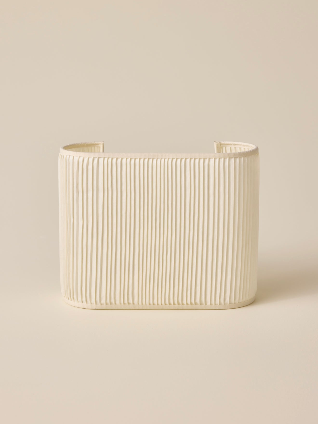 Oval pleated wall lamp