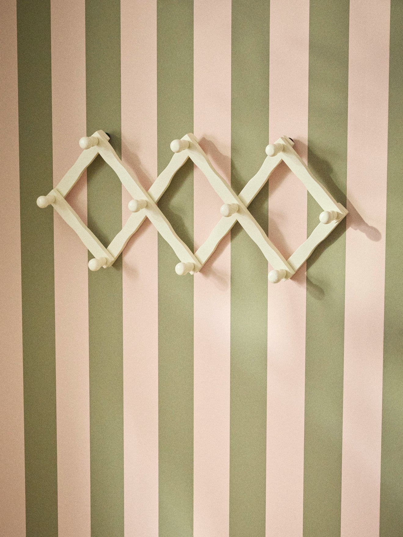 Wooden accordion coat hook