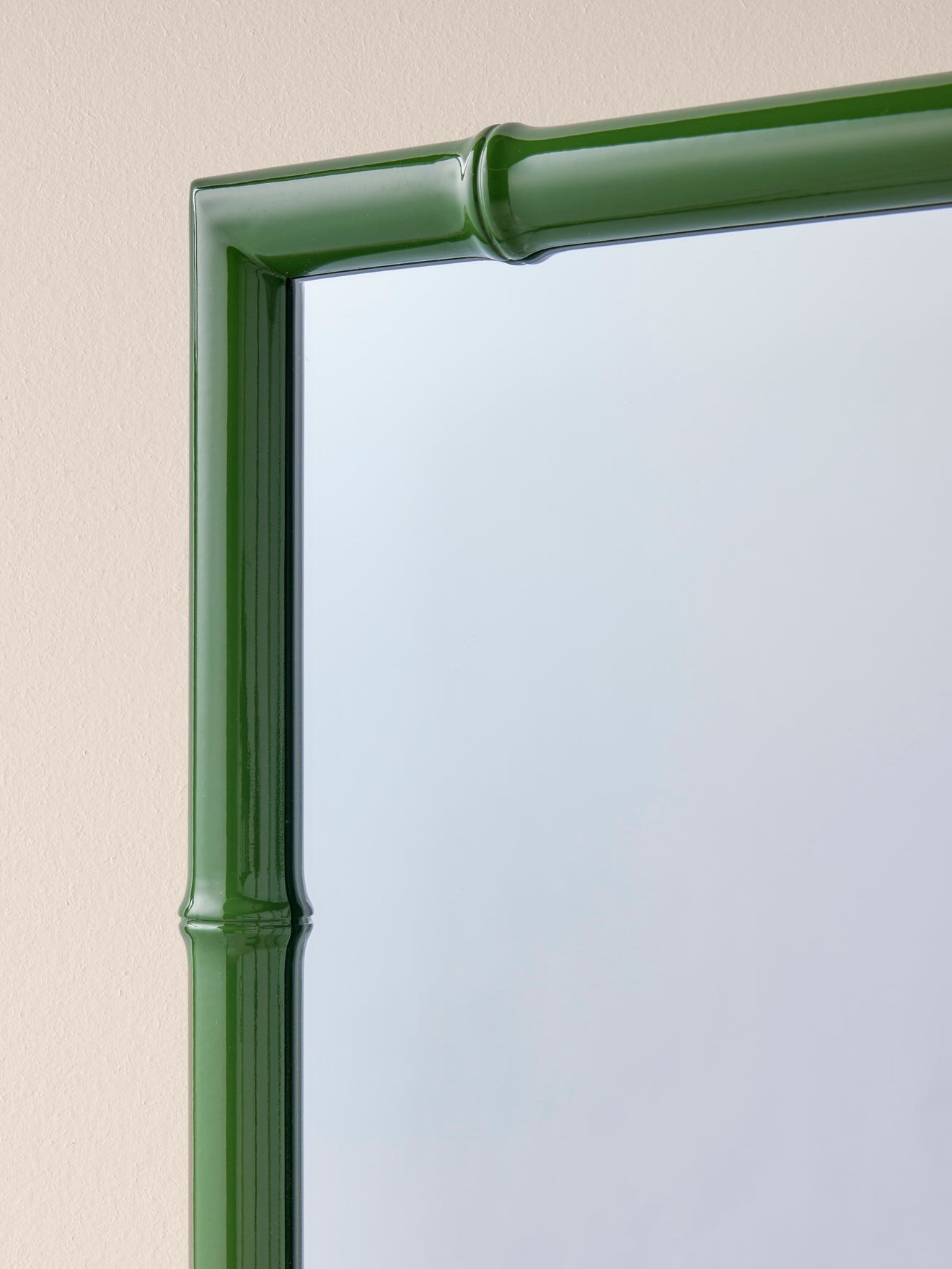 Wooden mirror with sculpted bamboo stalks