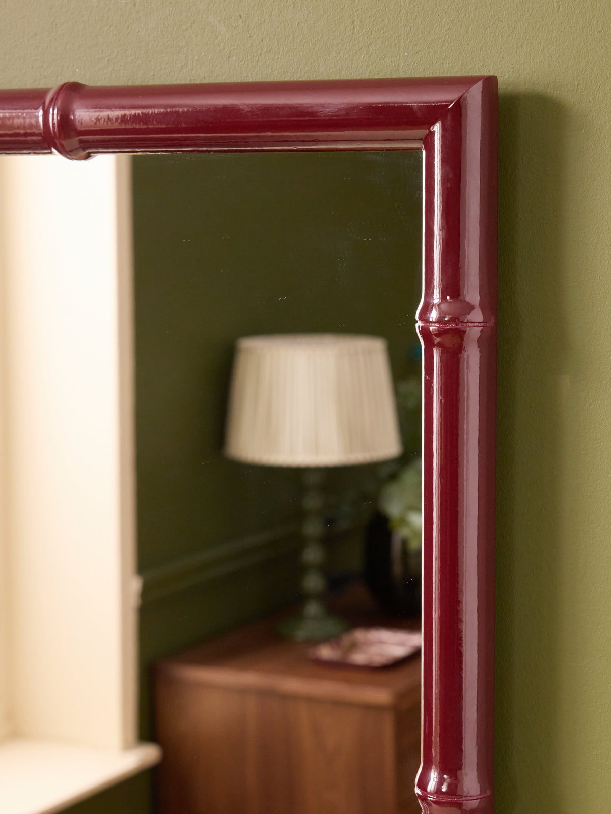 Wooden mirror with sculpted bamboo stalks