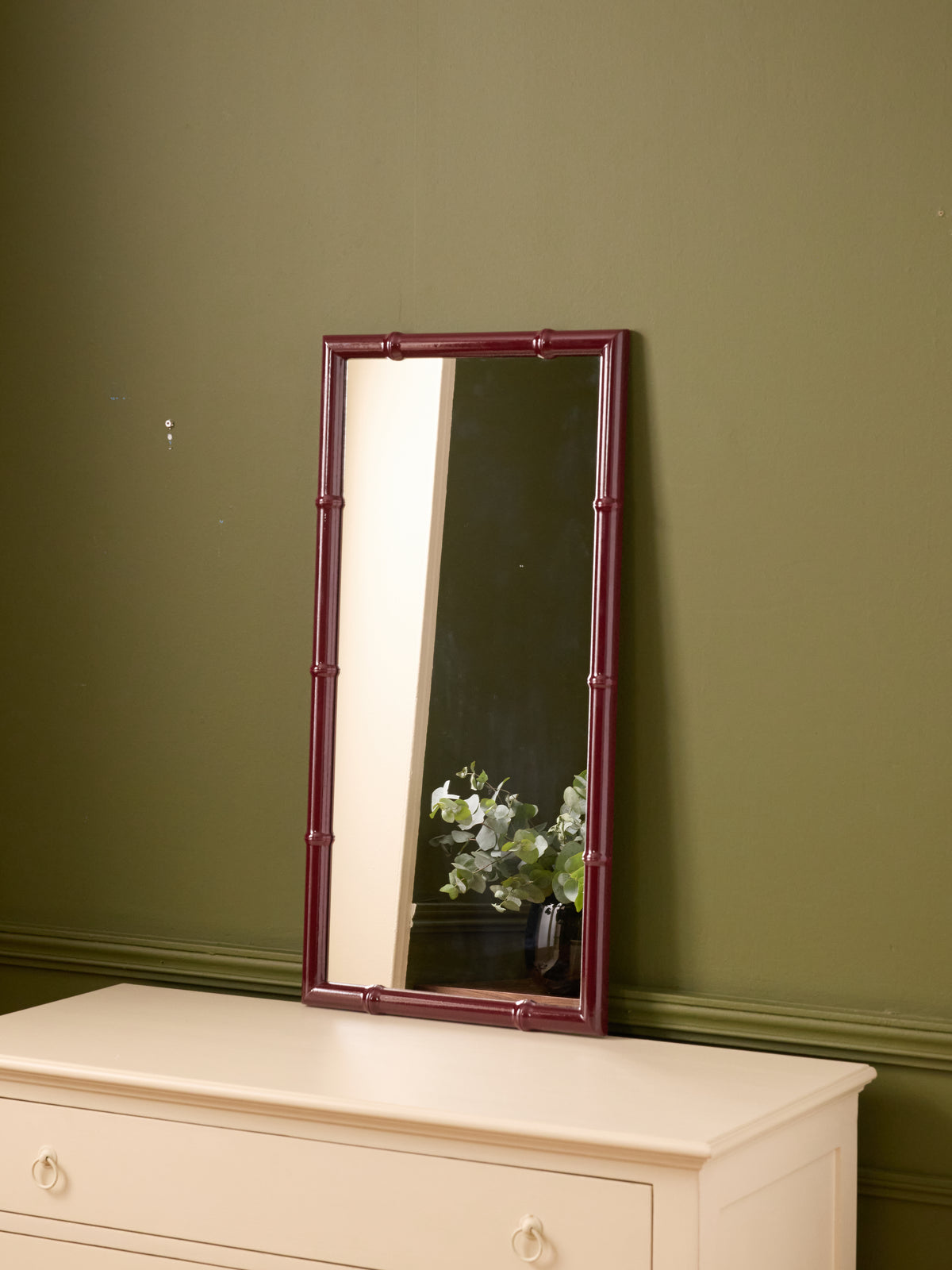 Wooden mirror with sculpted bamboo stalks