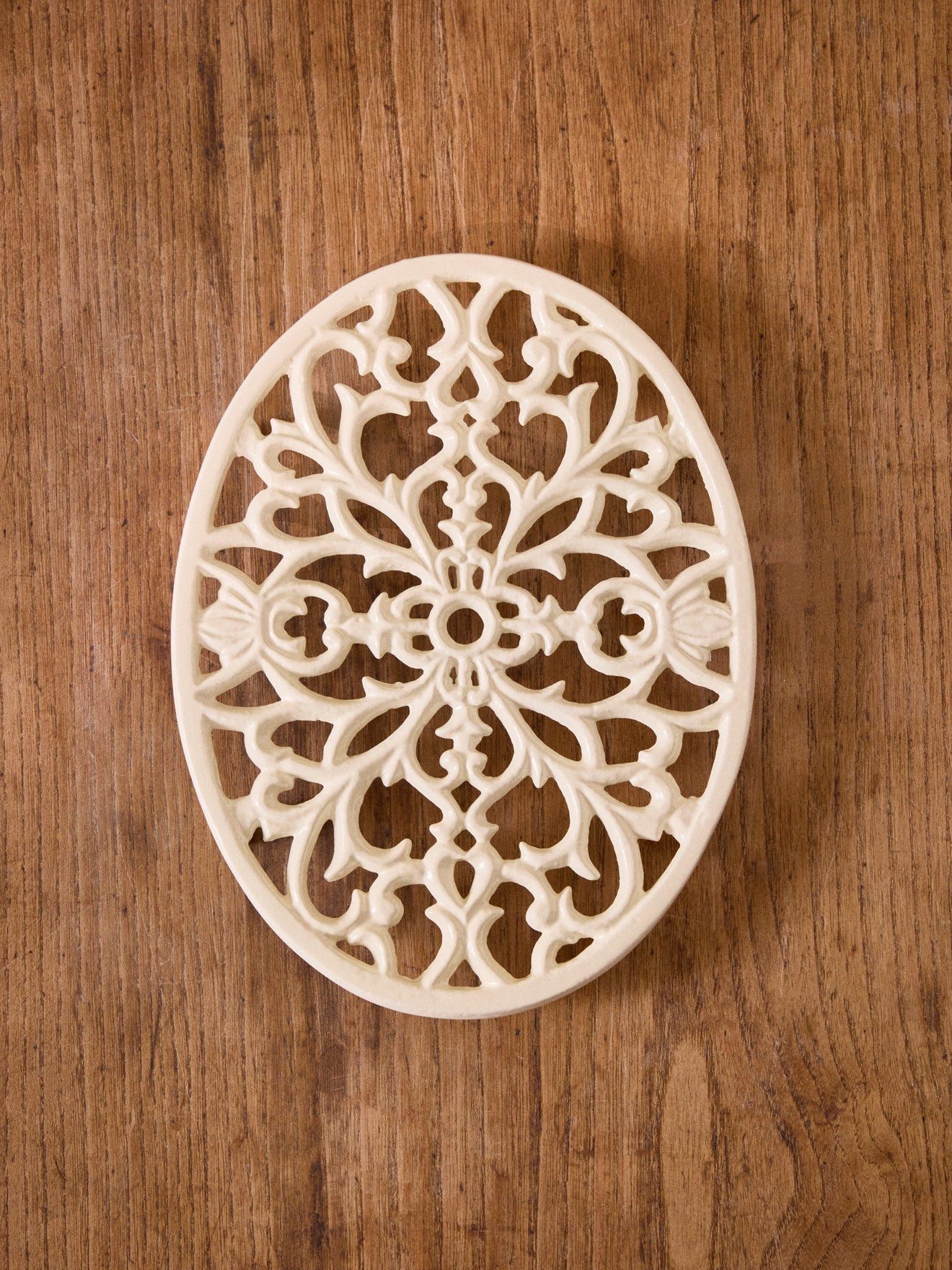 Dessous de plat oval en fonte