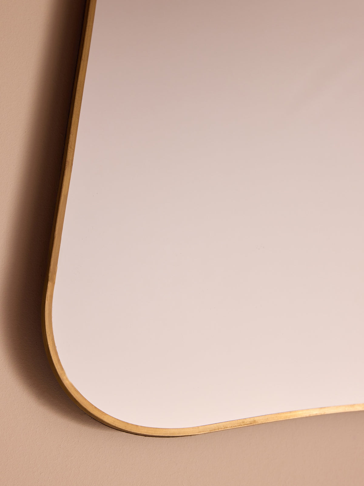 Octave brass wall mirror