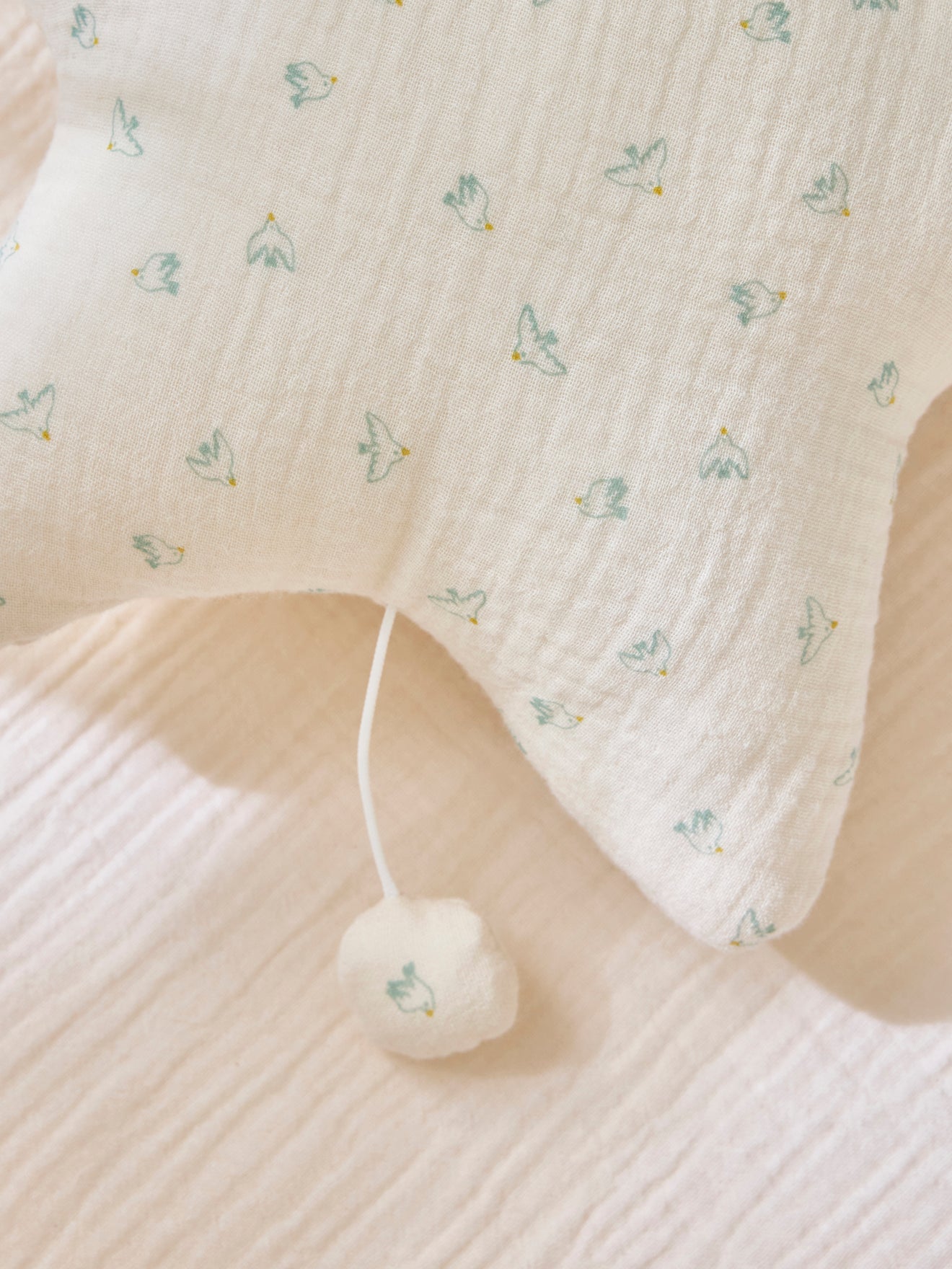 Étoile musicale en gaze de coton