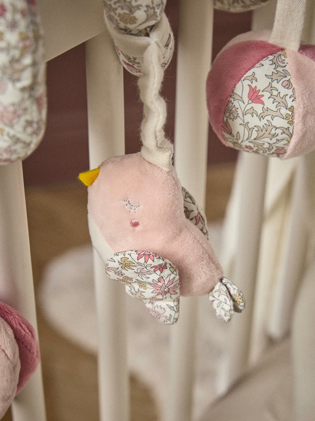 Activity spiral toy made with velvet and Liberty fabric