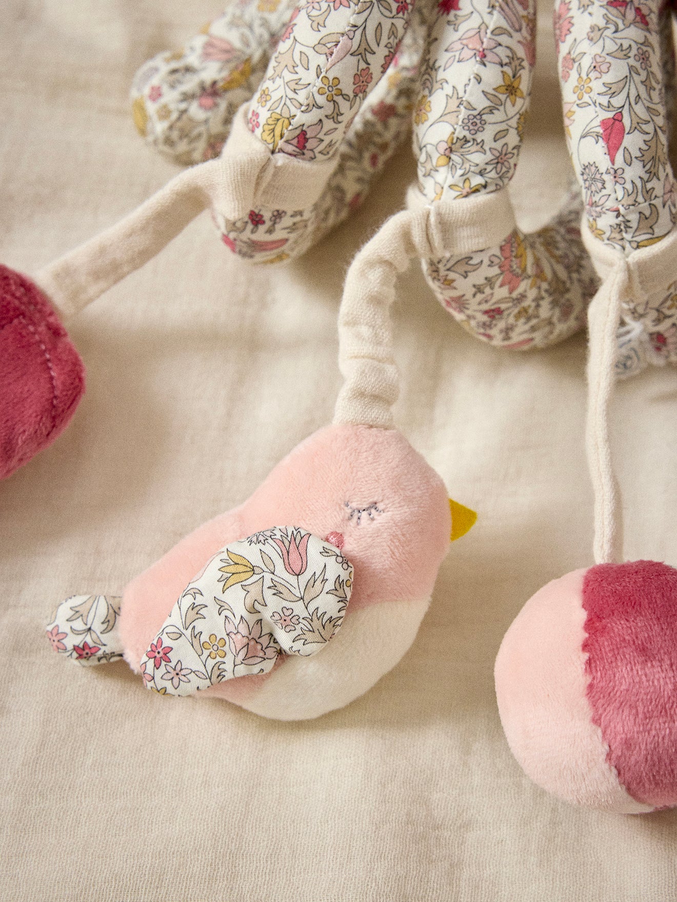 Activity spiral toy made with velvet and Liberty fabric