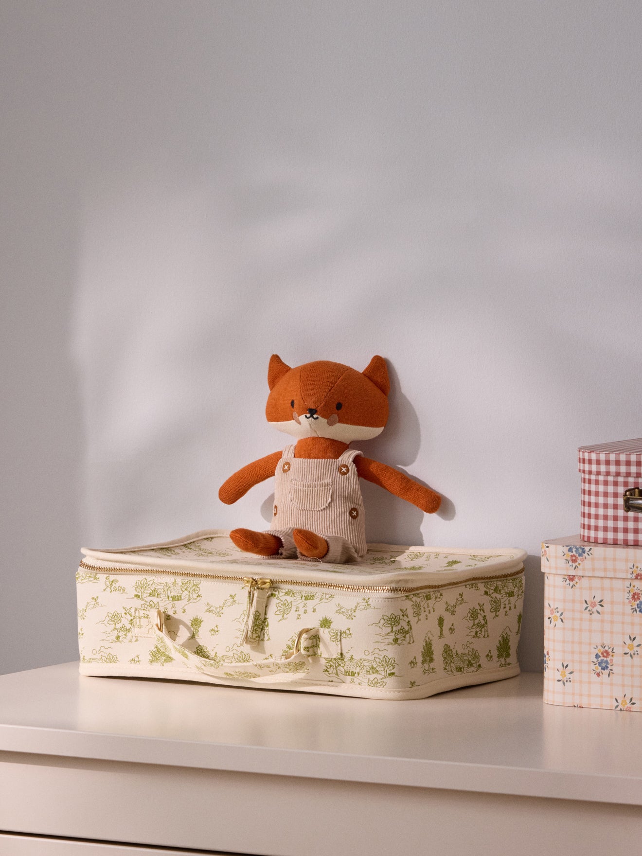 Knit fabric fox plush toy with velour overalls