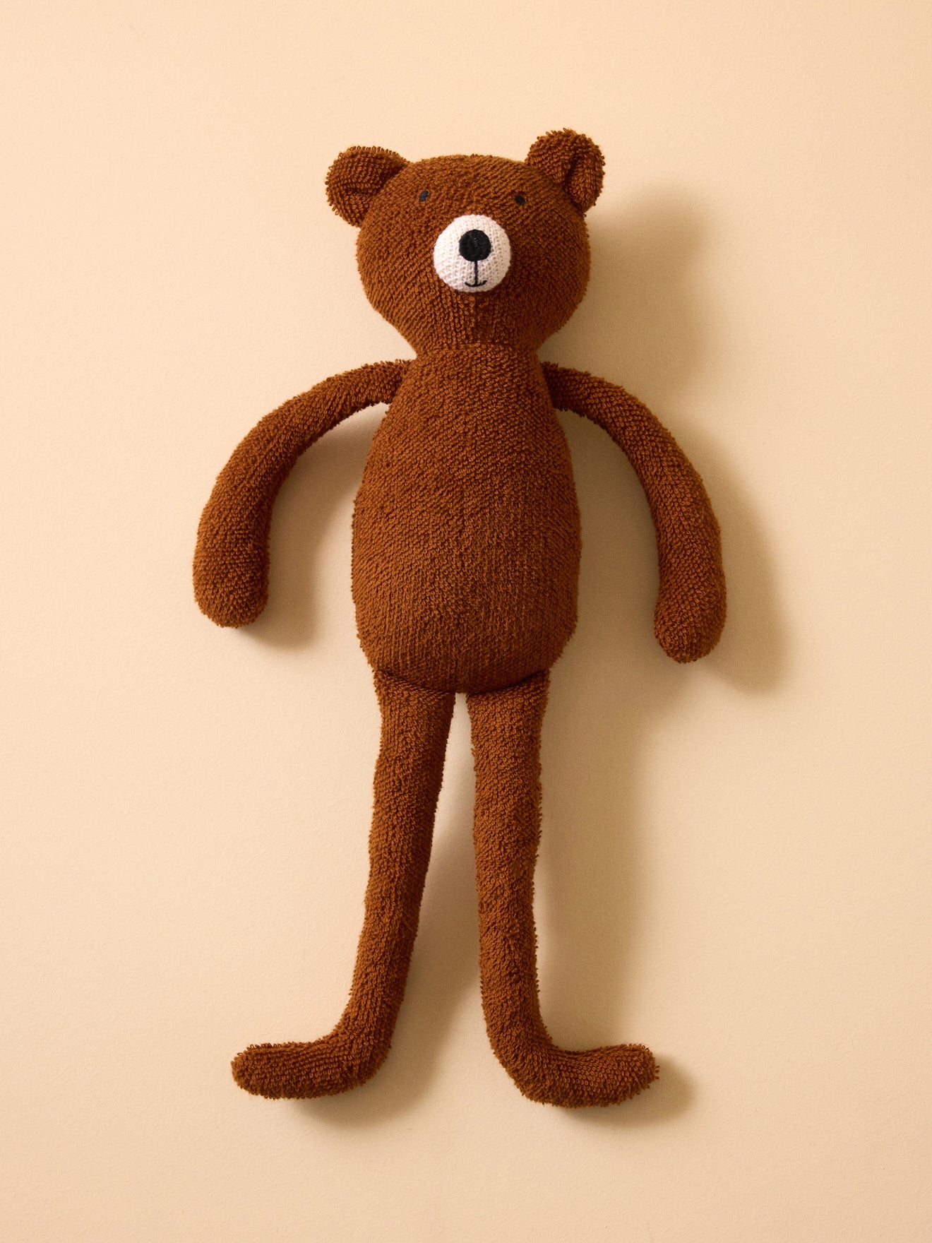 Peluche ours en bouclette